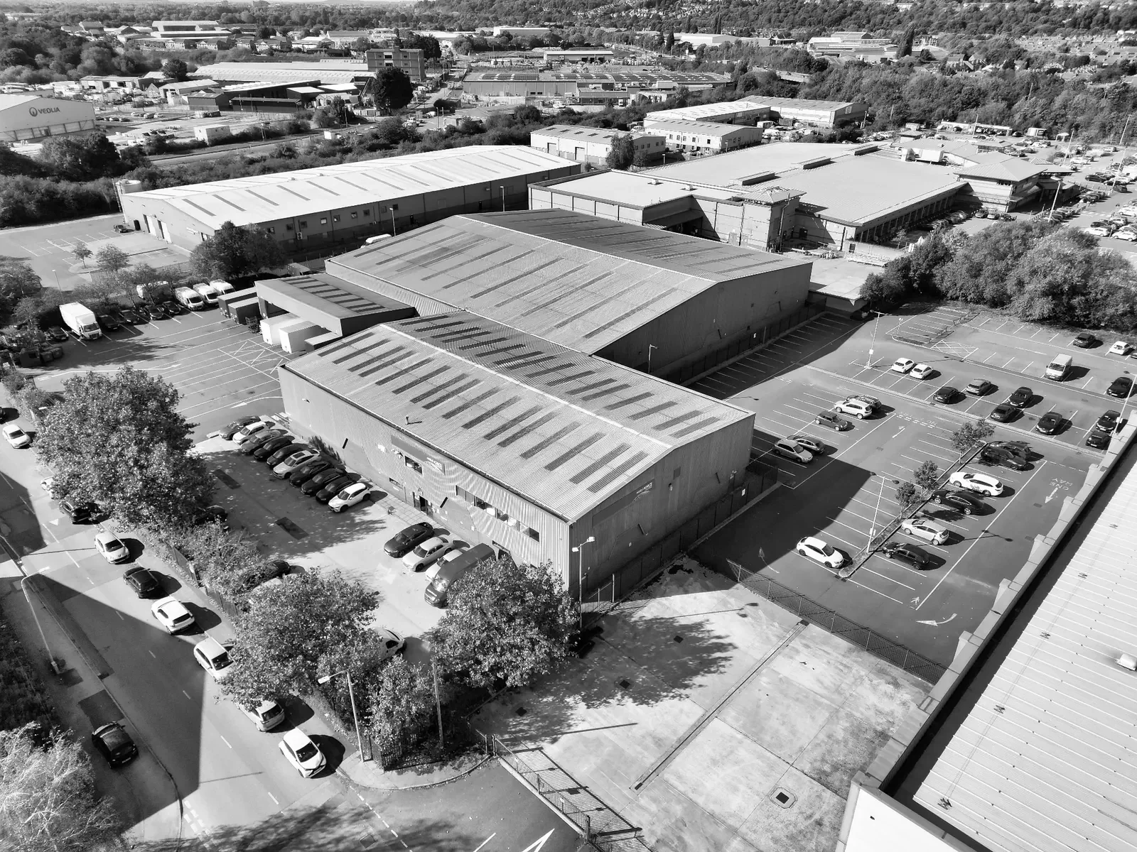 Aerial view of industrial warehouse units and surrounding business park