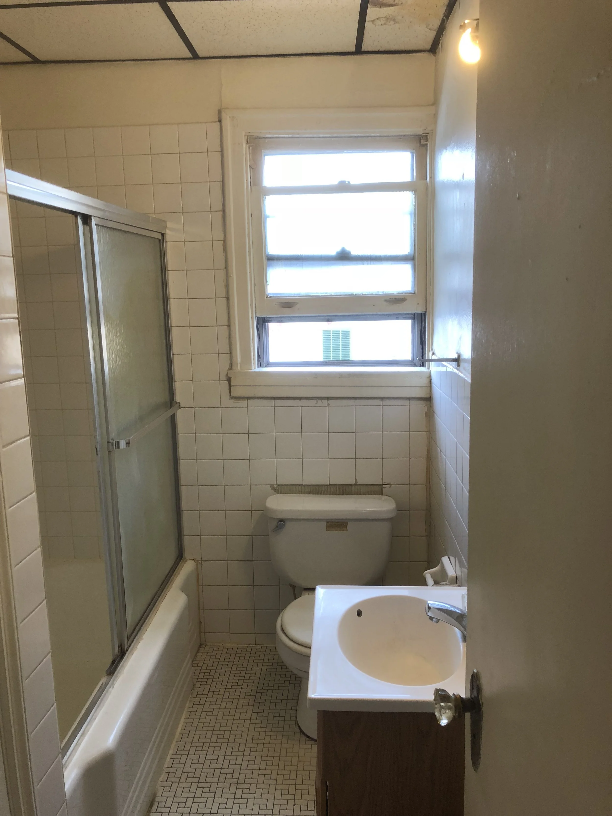 "Clean bathroom in Buffalo, NY after professional deep cleaning with sanitized sink, polished tiles, and sparkling surfaces."