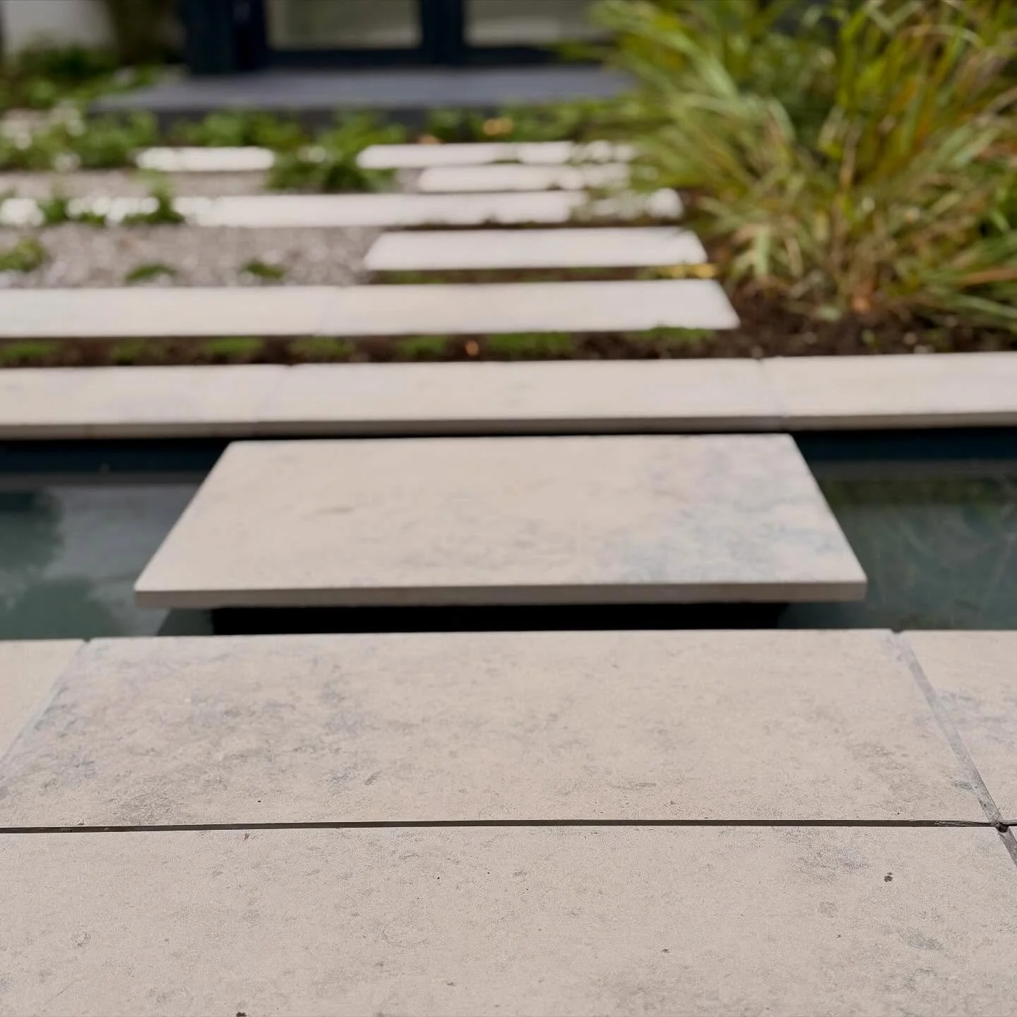 A just completed small garden in SW4. Our client wanted a studio at the end of the garden to serve as an office and a walk over water feature to divide the two spaces.  He had seen a design we had done about 5 years ago and wanted to replicate it. I 