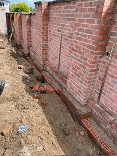 Garden wall foundation and brickwork in progress Glasgow, Milton of Glampsie 