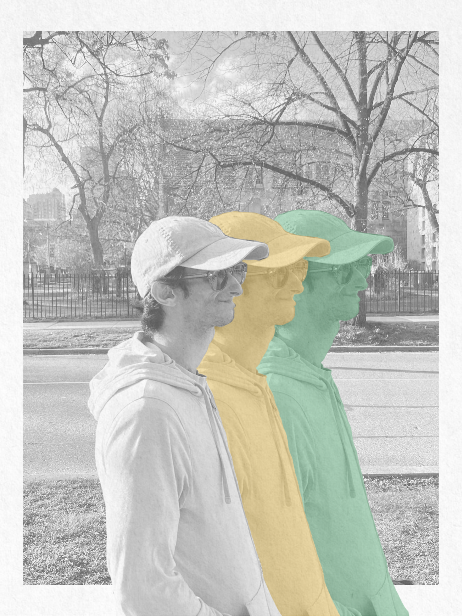 Black-and-white photo of a young man wearing a cap and sunglasses, standing in front of a park with leafless trees, overlaid with colored silhouettes of the same person in yellow and green.