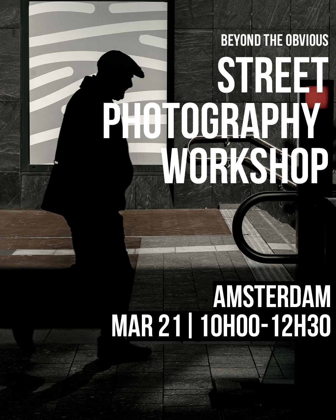 Silhouette of a man walking past a sign advertising a street photography workshop in Amsterdam on March 21 from 10:00 AM to 12:30 PM.