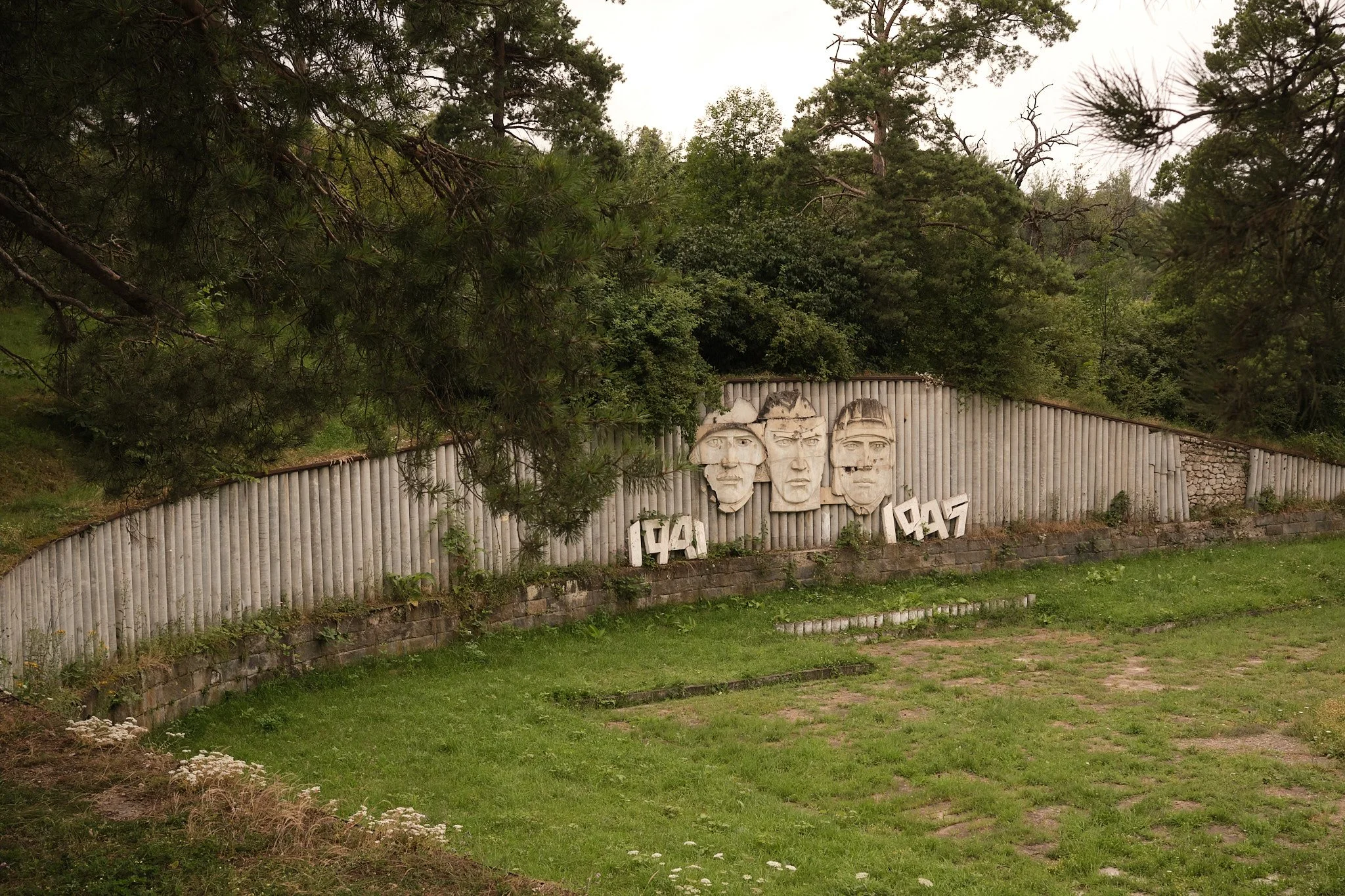 Second World War memorial from the years of the Soviet Union’s war against Nazi Germany, often called the Great Patriotic War. Bullet holes punctuate their faces - wounds which may have been inflicted in several different conflicts since; Shusha, Kar