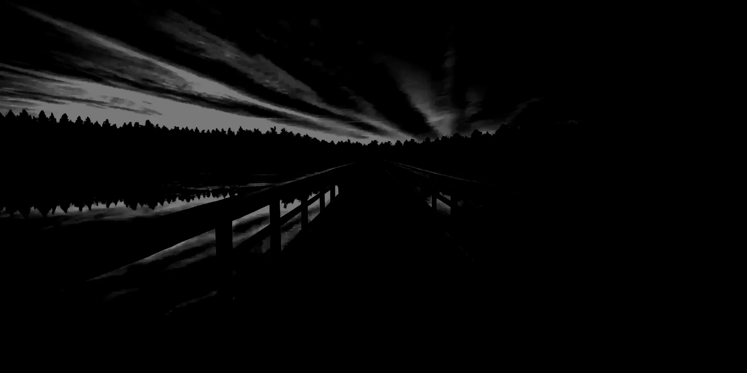 Ponton en bois menant vers l’horizon symbolisant un processus de transition et de clarification