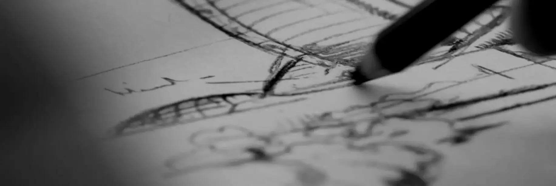 Stylo traçant un schéma technique détaillé en noir et blanc, symbolisant la traduction pédagogique des expertises complexes et la clarification des enjeux métiers – Fulgurance, ingénierie et communication technique.