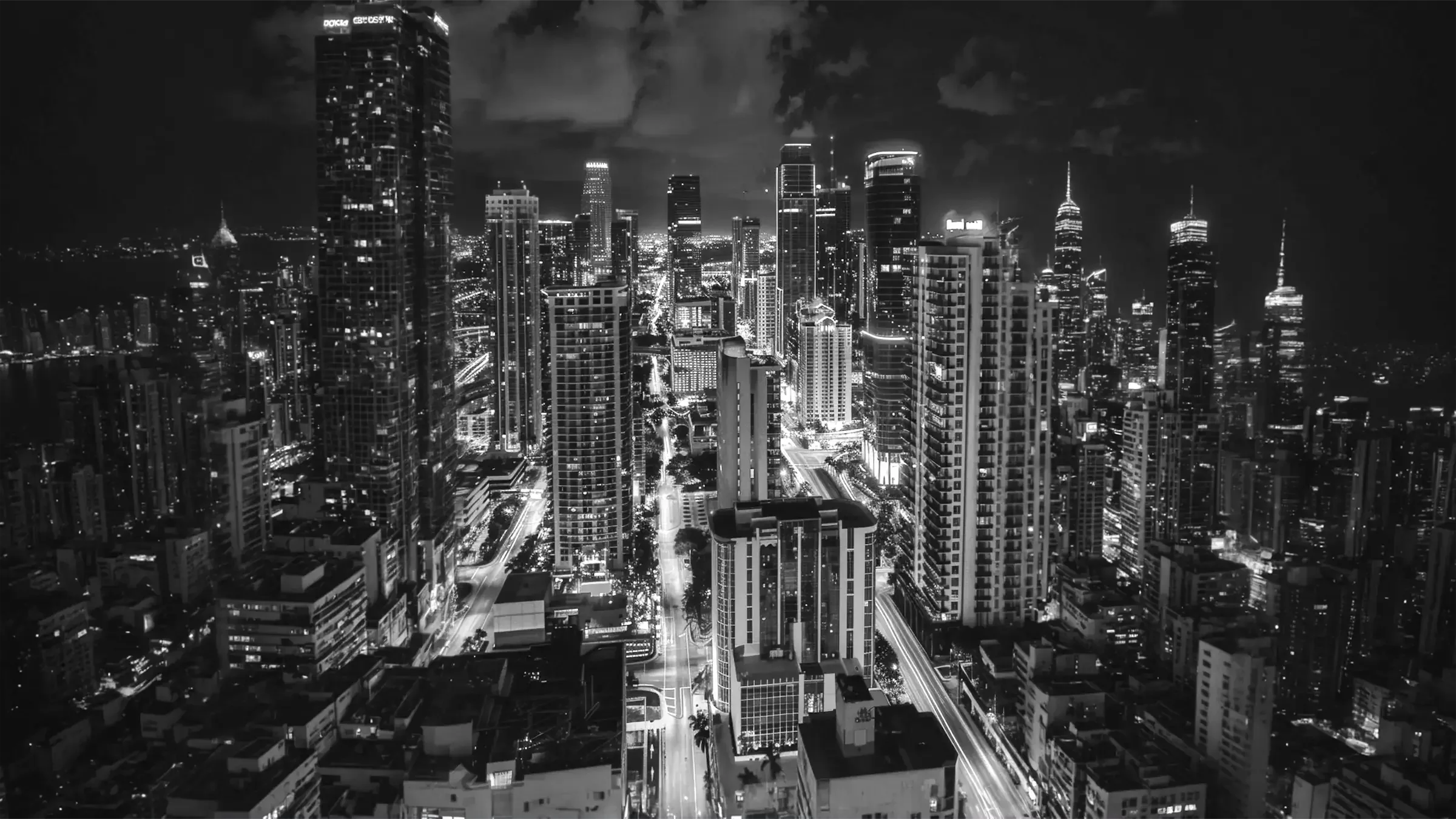 Skyline nocturne d’une métropole, mettant en valeur l’ambition architecturale et l’excellence technique d’une tour iconique – Fulgurance.