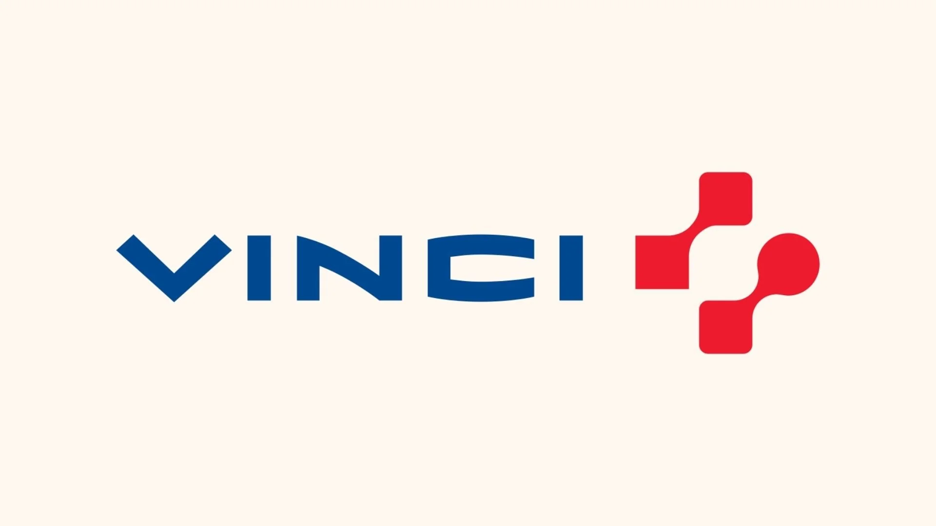 Logo de Vinci avec le nom 'Vinci' en bleu et un symbole rouge stylisé à côté.