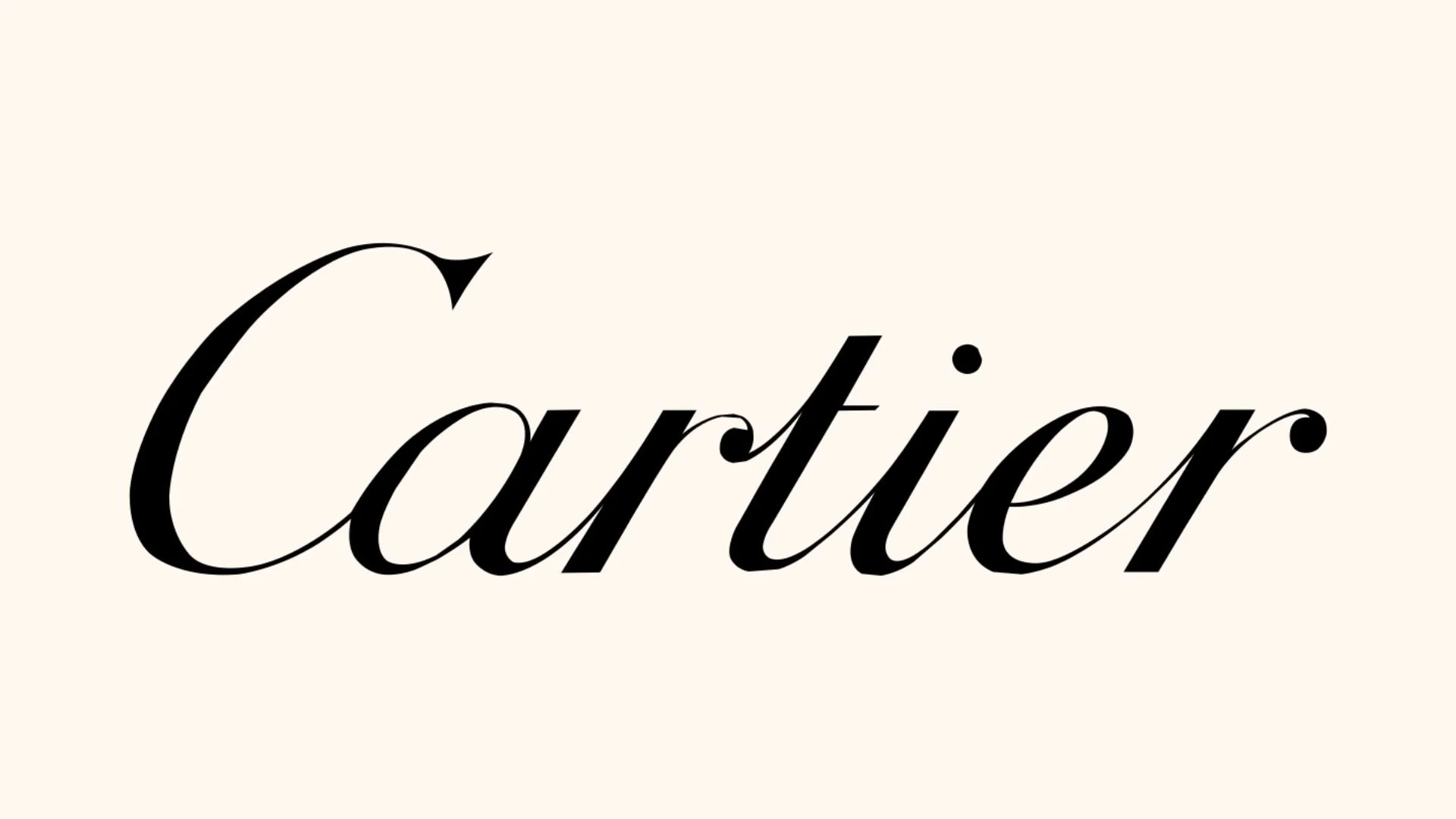 Le logo de Cartier en lettres cursives noires sur fond blanc