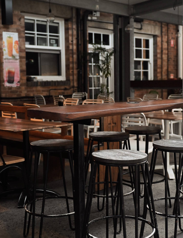 The-Drink-Journal-Reverends-Coffee-Co-Outdoor-Seating-Courtyard.png