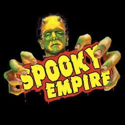 A zombie-like face with greenish skin and yellow hair holding a sign that says 