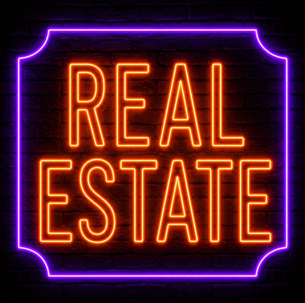 Neon sign reading 'Real Estate' in orange and purple lights against a brick wall.
