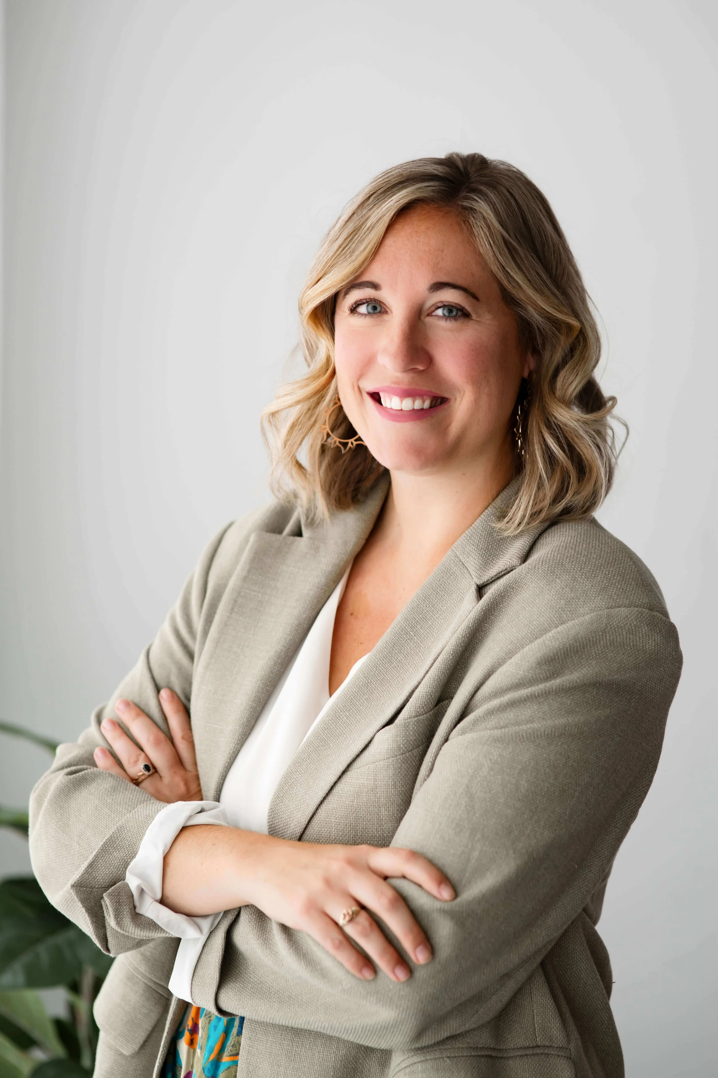 Sam Smith child psychologist and infant mental health specialist posing for headshot smiling at the camera