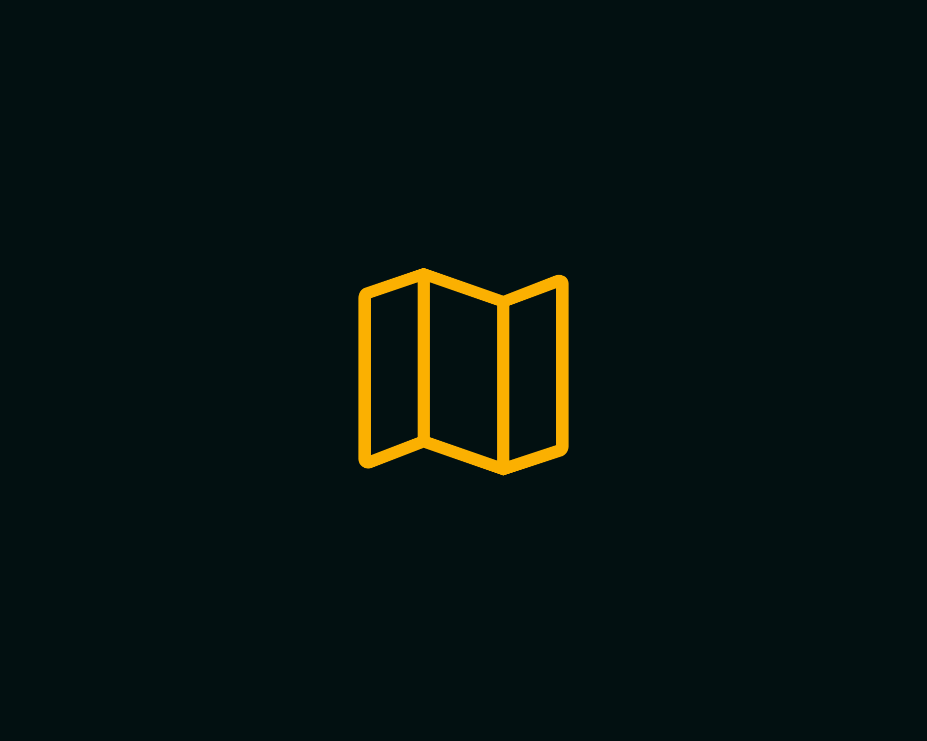 Scenic landscape of a lake surrounded by rolling hills and towering mountains in the distance under cloudy skies.