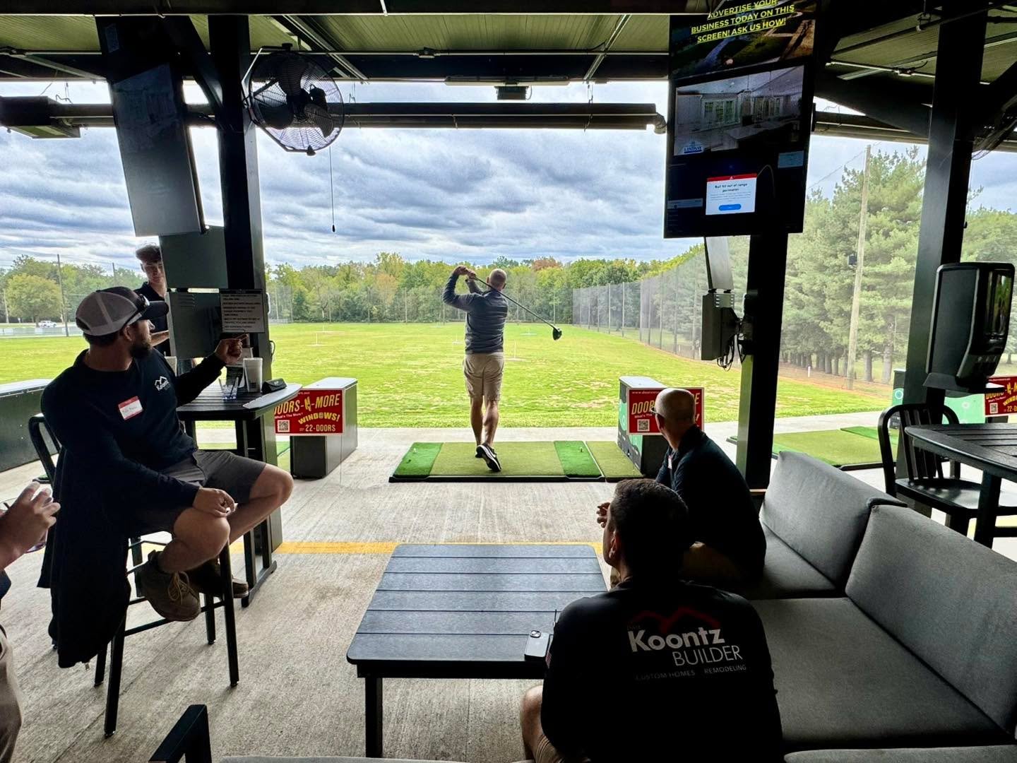 Taking the afternoon to hit some balls and enjoy some networking at the Doors N More, Inc. event at The Range at KC. Scott Koontz on the tee.