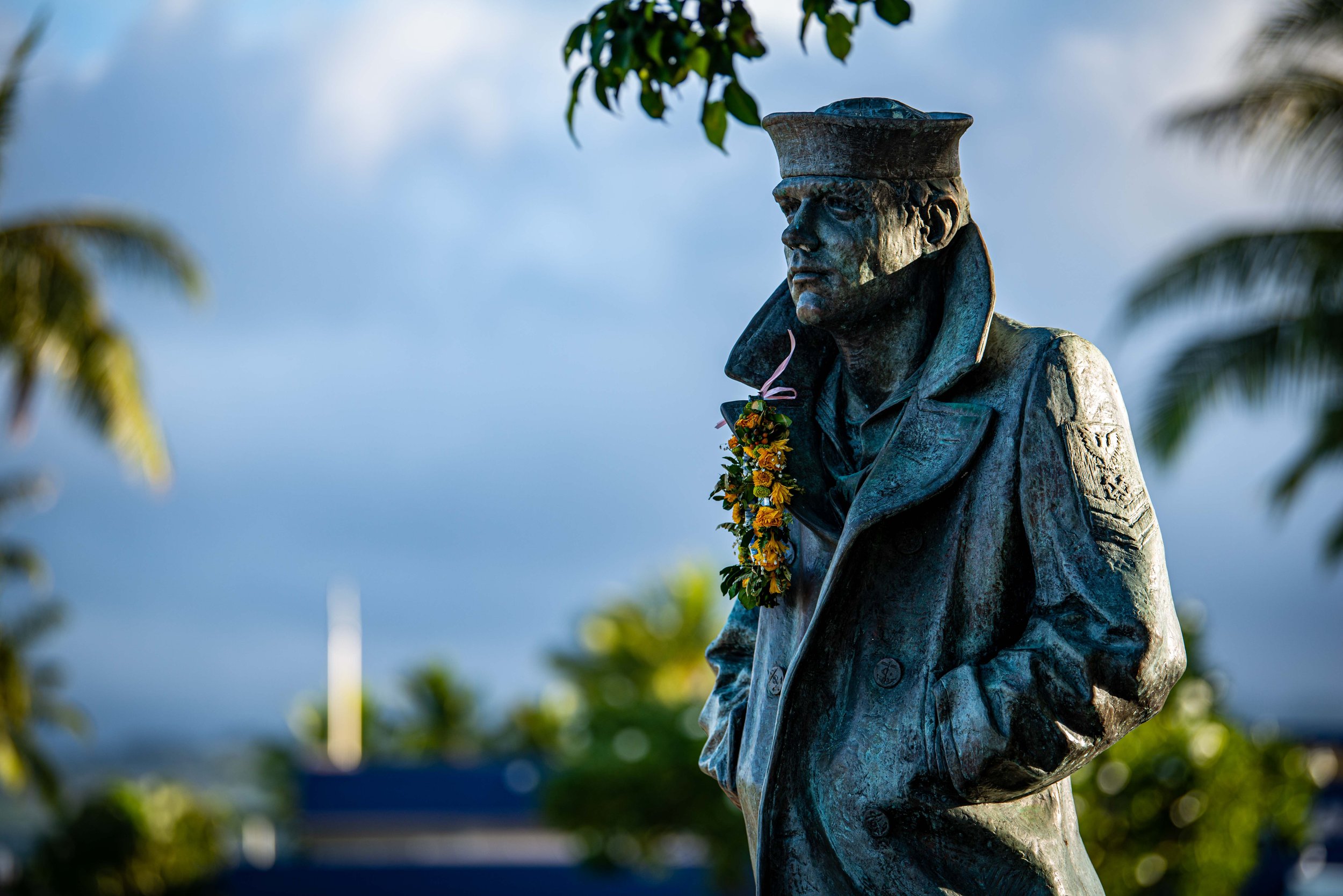 Statue of  sailor with lei at Pearl Harbor