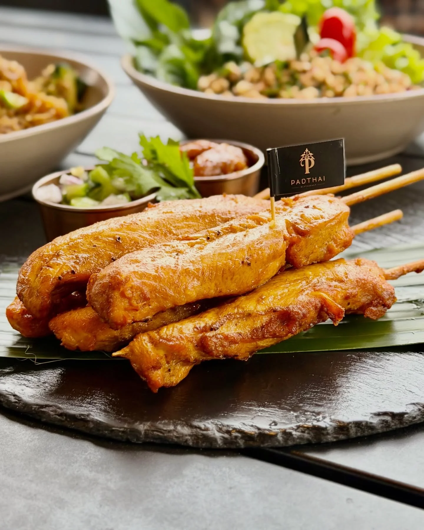 Our chicken satay is marinated, skewered, and grilled until juicy, then served with house peanut sauce and crisp sides for dipping and wrapping. Perfect for a midweek lunch plan or something to look forward to later today.

See you soon.

#PadThaiKC 