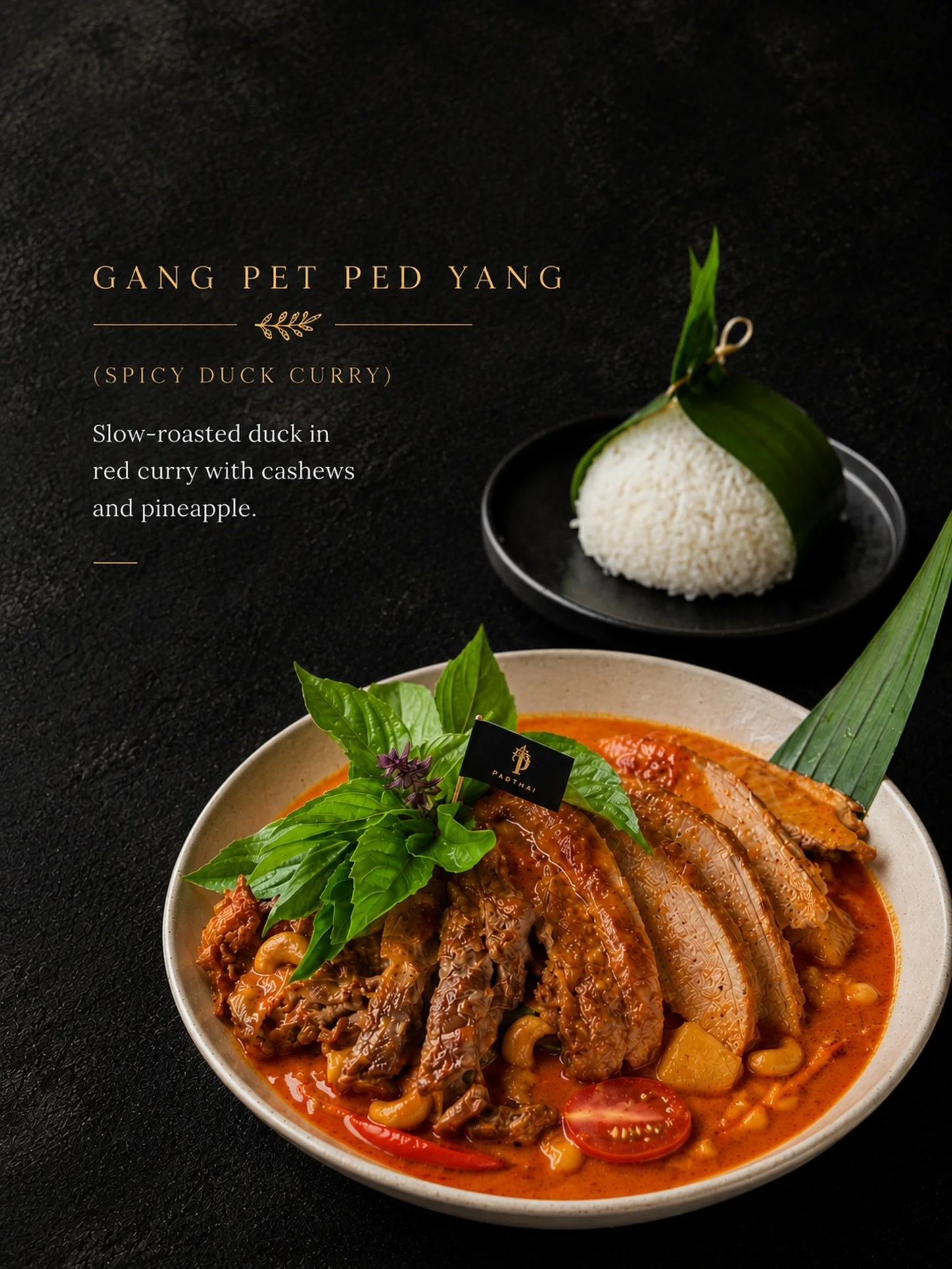Slow-roasted duck, rich red curry, cashews, and pineapple. Every bite brings together sweet, savory, and spicy flavors in a way only Thai cuisine can.

Gang Pet Ped Yang is a comforting classic and a perfect dish to share with family and friends arou