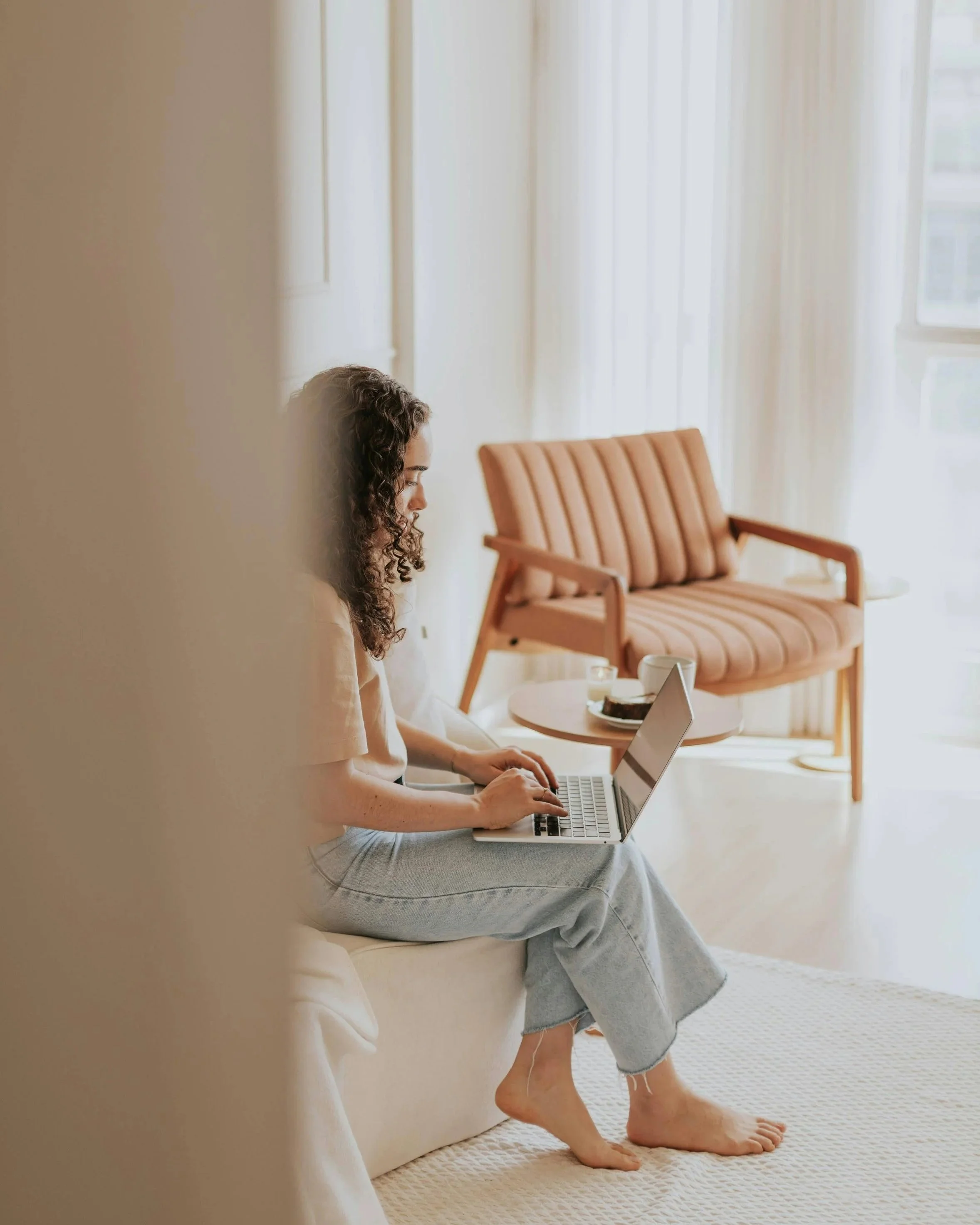 Woman with her laptop in a virtual consultation for therapy