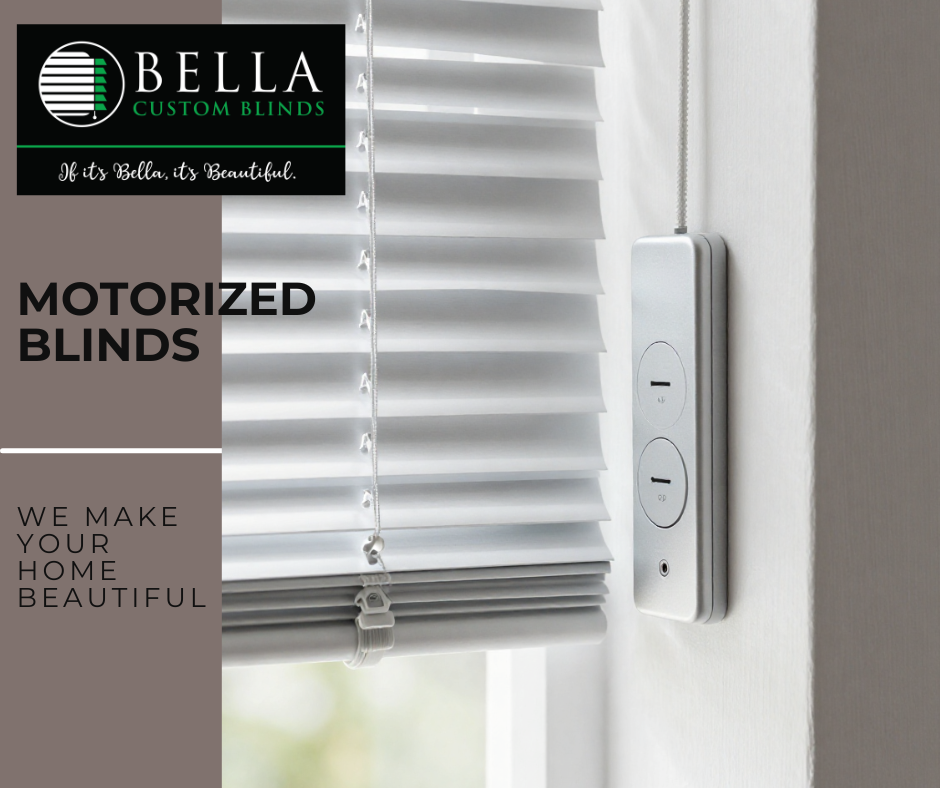 Close-up of white motorized blinds on a window with a remote control panel mounted on the wall beside it, part of promotional material for Bella Custom Blinds.
