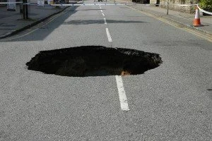The Hole In the Sidewalk