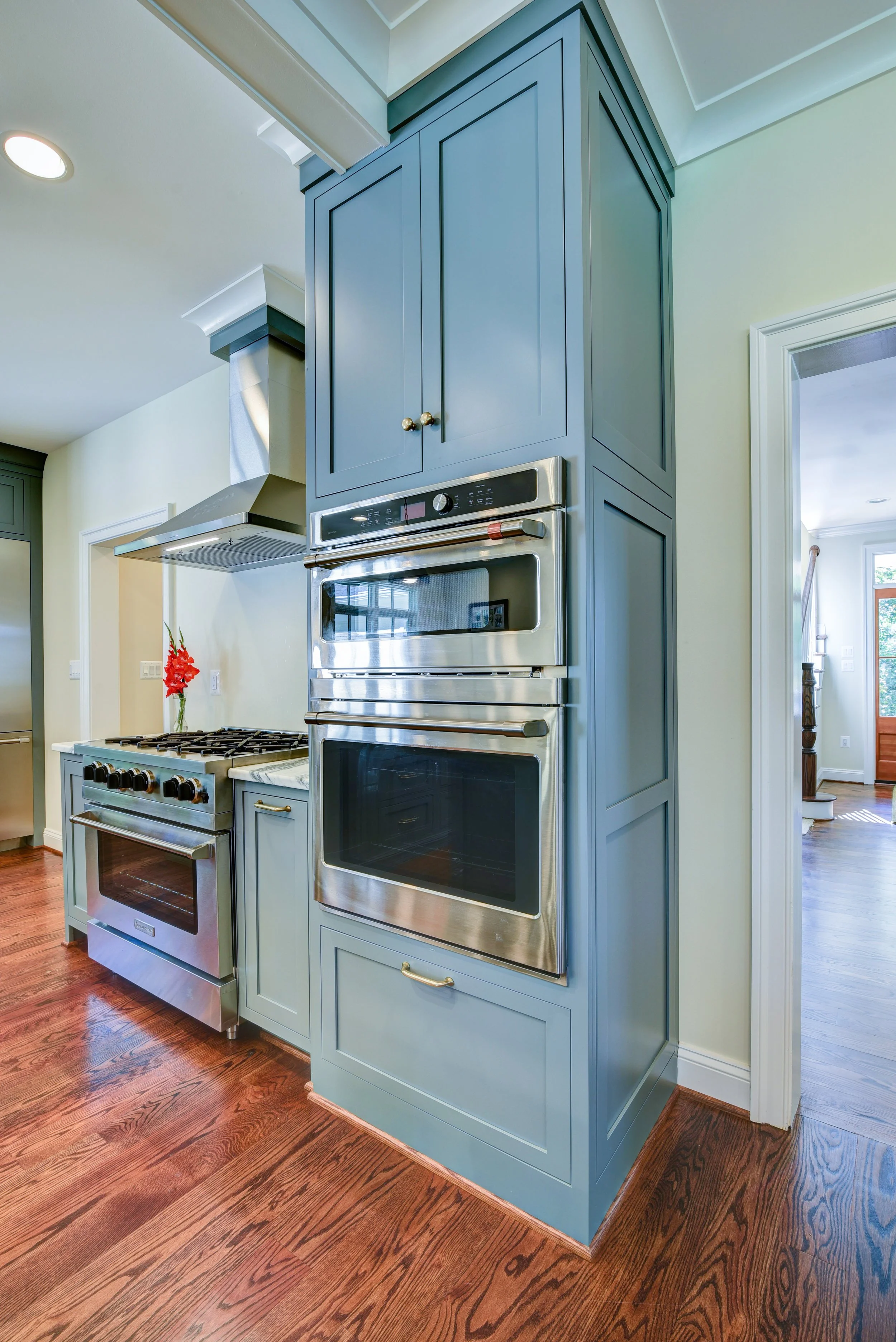 Oven Cabinet with  Tray Storage in Upper Section
