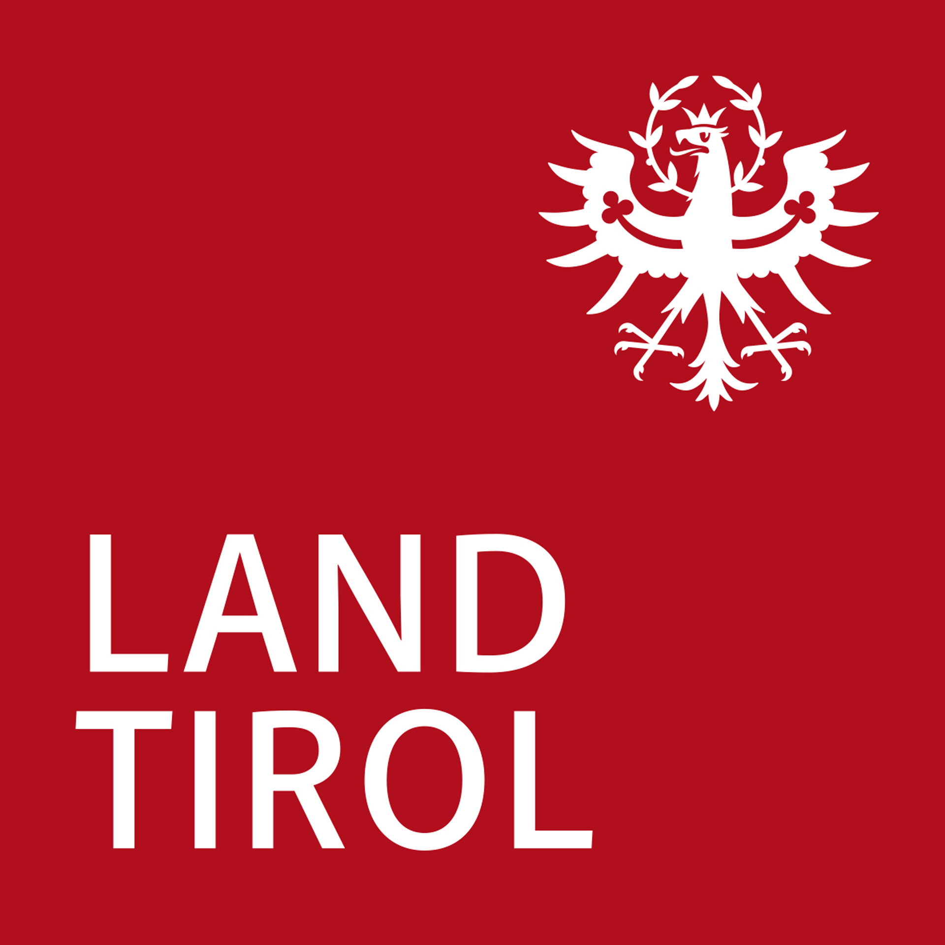 Die Flagge Tirols mit rotem Hintergrund, weißen Schriftzug 'LAND TIROL' und einem weißen Doppeladler-Wappen oben rechts.