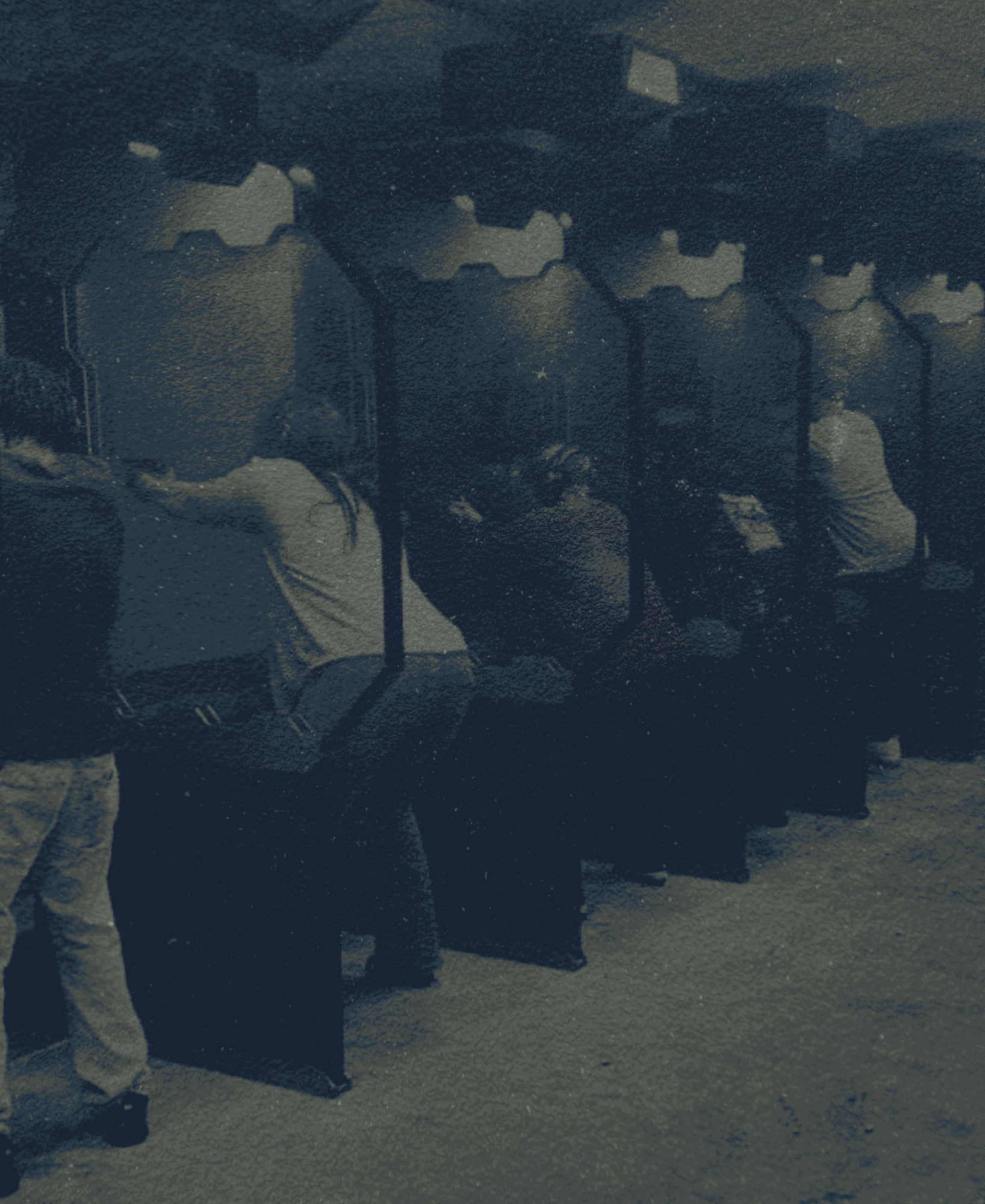 A group of people in firearm training classes.