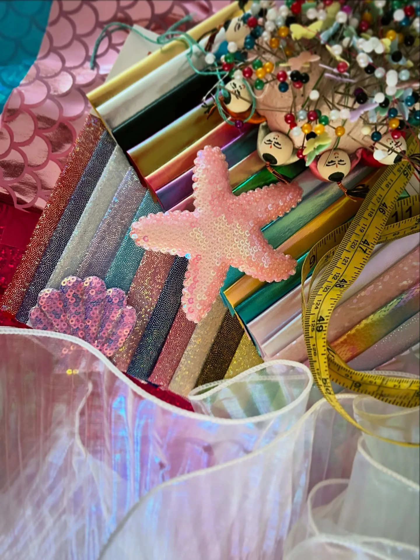 Glimmers of creating a whimsical mermaid brand- fabric swatches and work tools - making a dream come to life detail by detail&hellip; 🧜&zwj;♀️💖✨ 
#whimsymaxxing  #mermaidcore #mermay2026