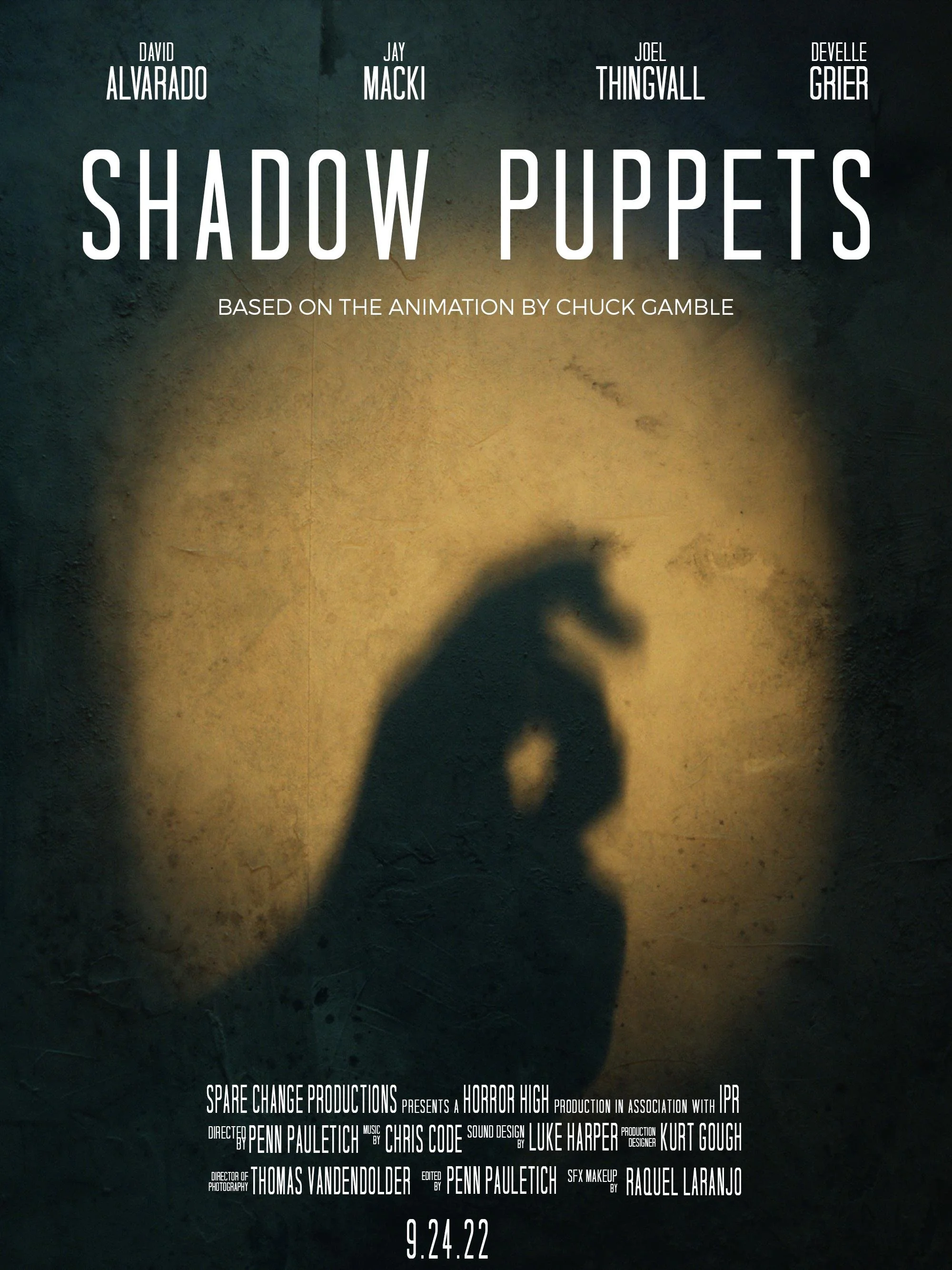The poster for the movie 'Shadow Puppets,' featuring credits for cast members David Alvarado, Jay Macki, Joel Thingvall, and Deville Grier. The background shows a shadow of a person holding a rope or cord against a wall. The poster mentions the film 