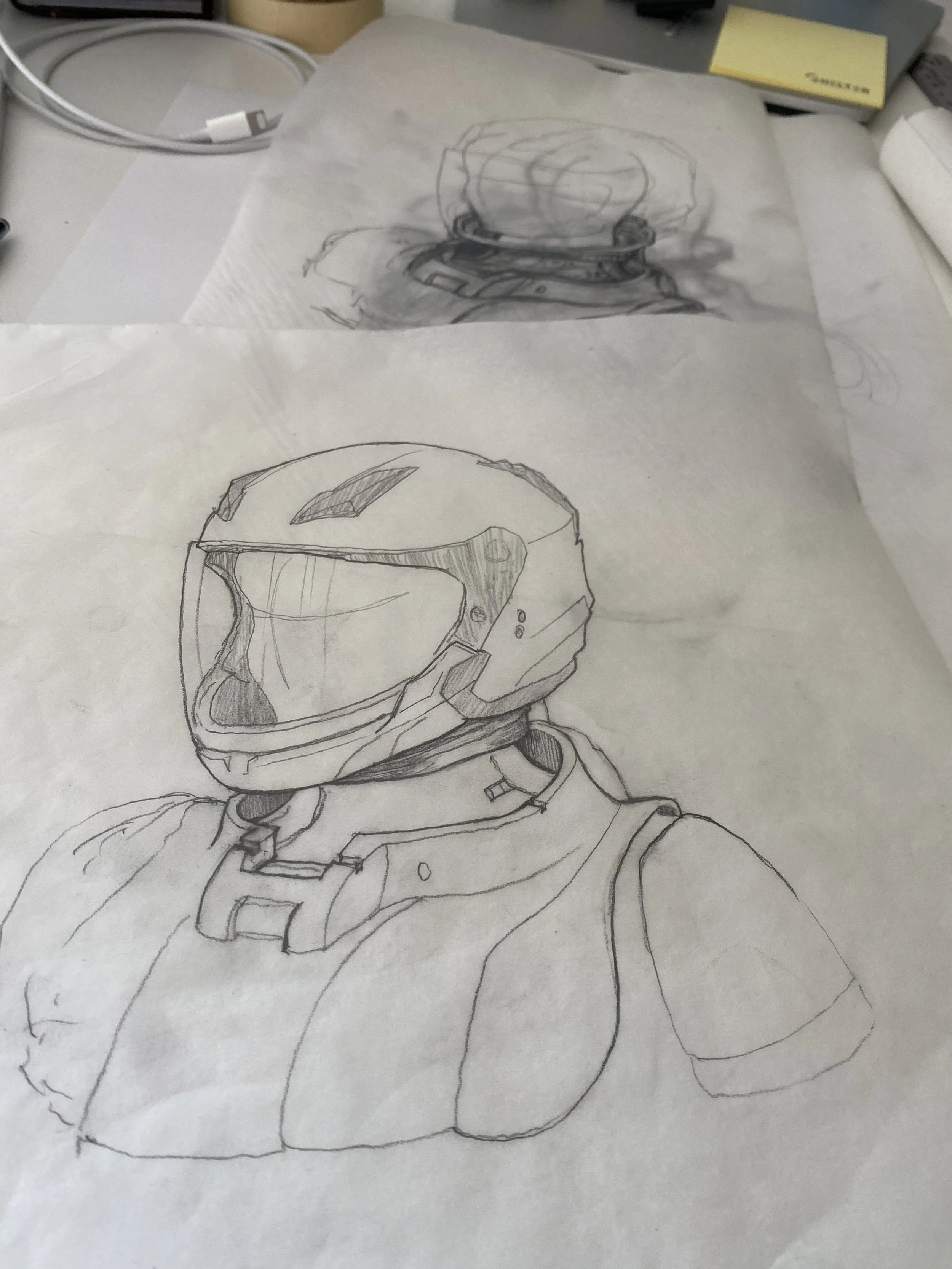 A black and white sketch of a person wearing a helmet and a suit, an astronaut, drawn on a piece of paper.