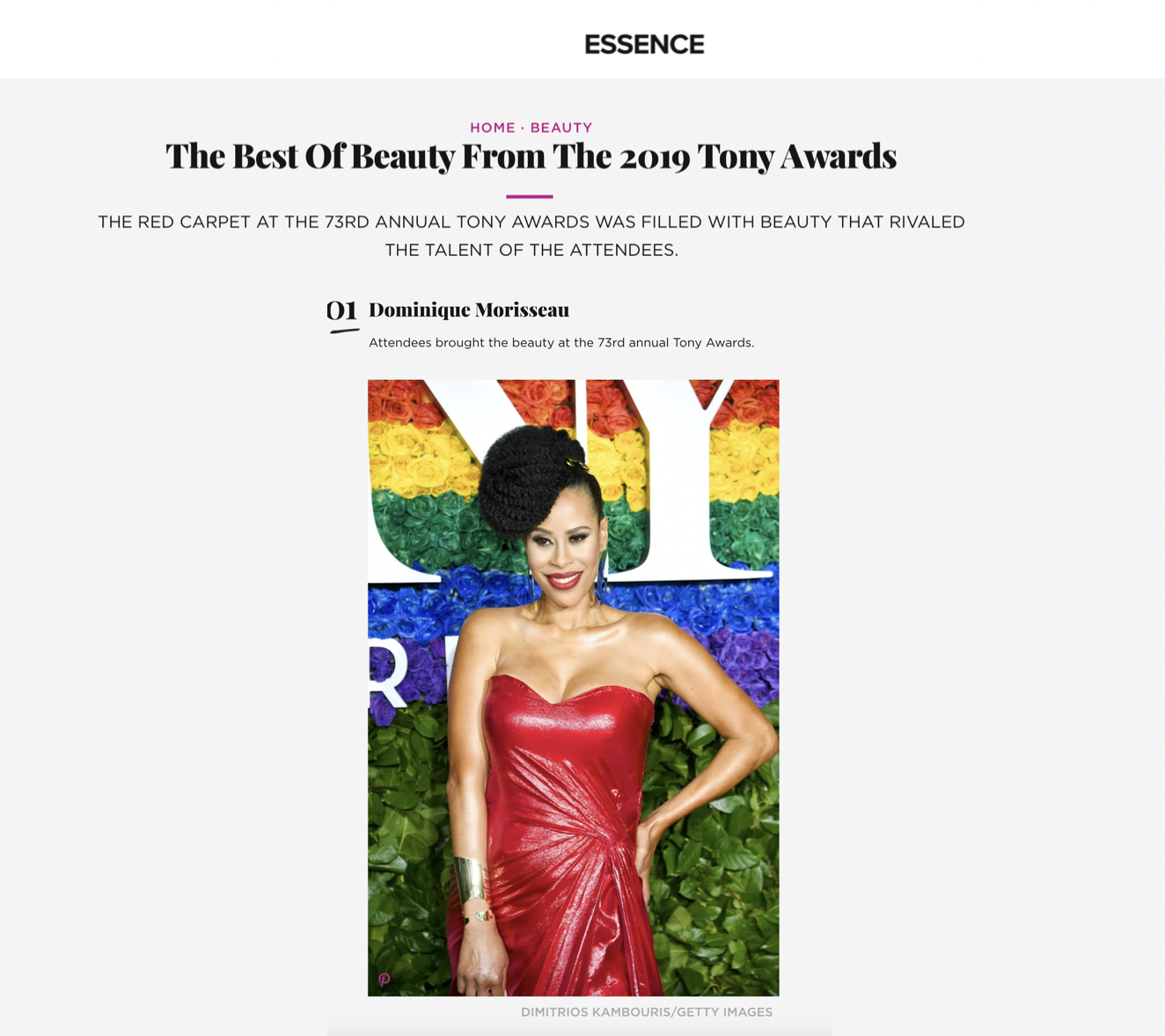 Essence — The Best Beauty at the 2019 Tony Awards. Dominique Morisseau in a red shiny gown on the red carpet, styled by Chandra Moore.