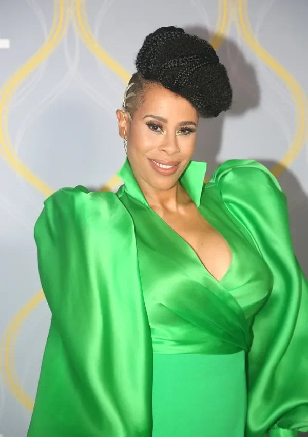 Close-up of Dominique Morriseau on the red carpet wearing a  custom gold Lorraine West ear cuff, styled by Chandra Moore.
