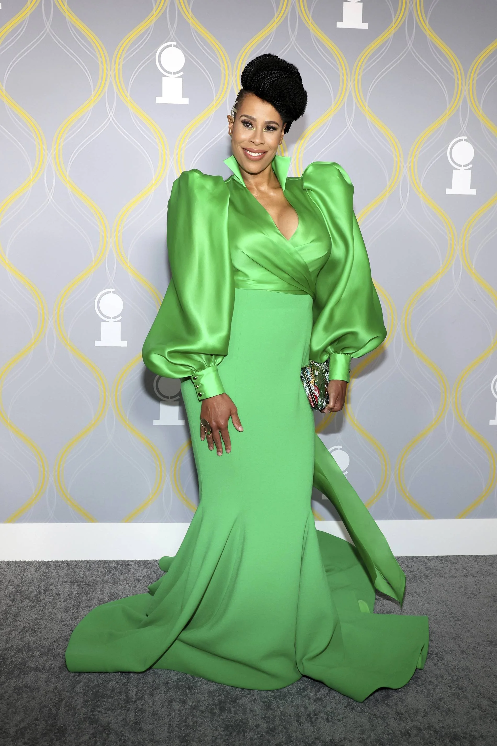 Writer and Actress Dominique Morisseau wearing a kelly green Sergio Hudson gown on the 2022 Tony Awards Red Carpet. Styled by Chandra Moore.