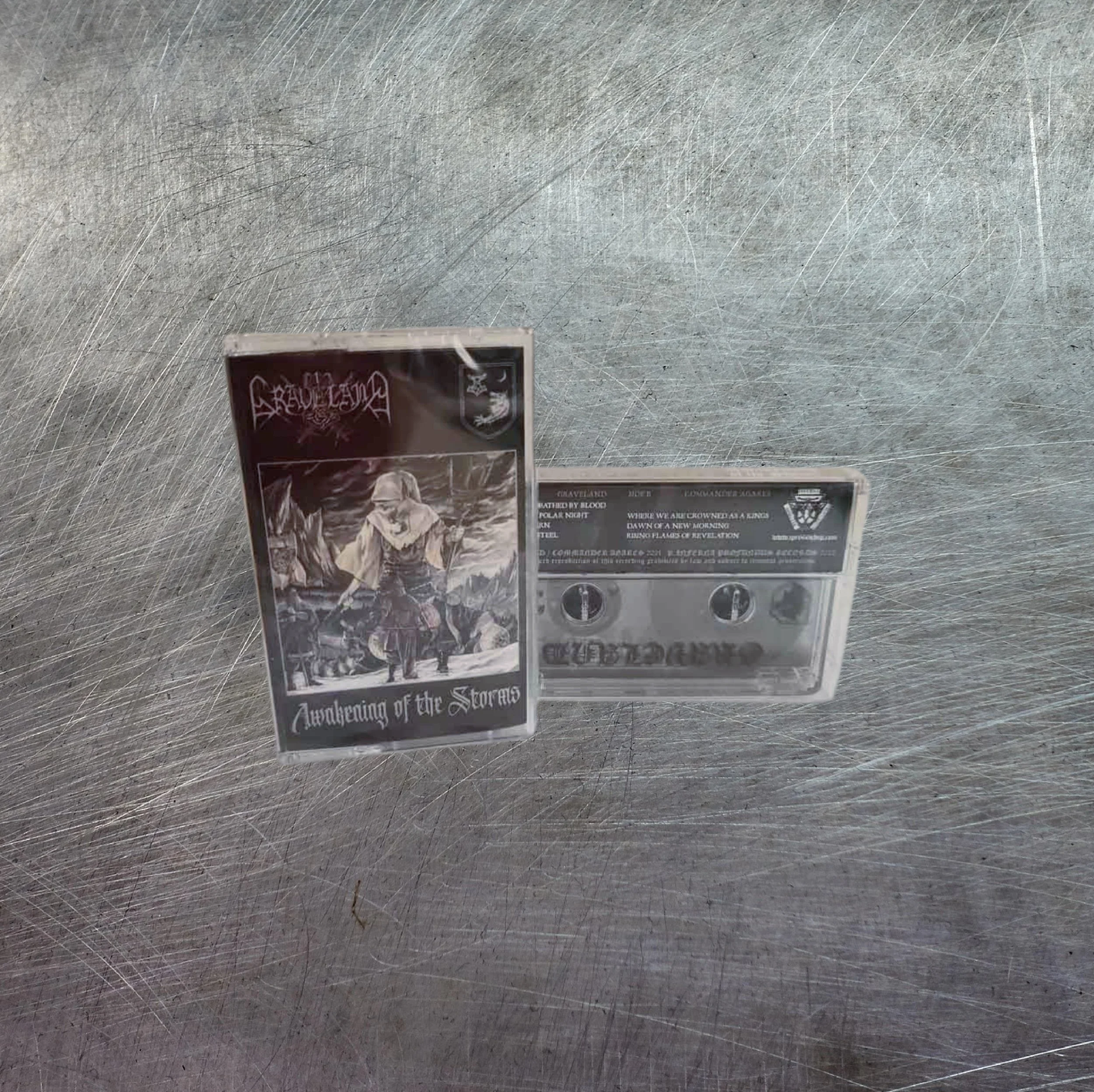 GRAVELAND / COMMANDER AGARES "Awakening Of The Storms" CASSETTE