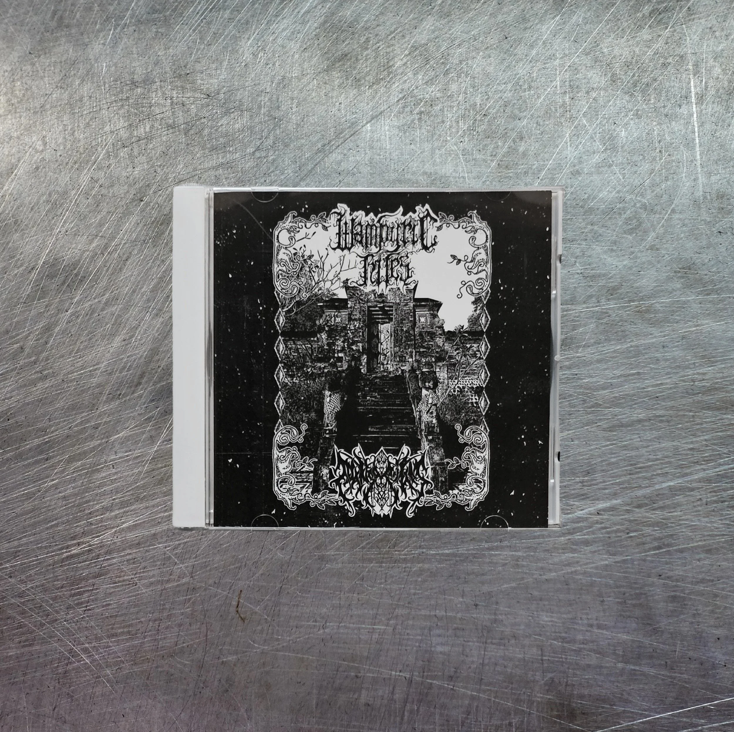 WAMPYRIC RITES / NANSARUNAI "The Astounding Proliferation Of Rites" CD