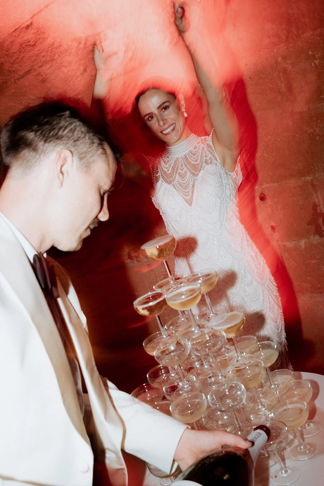 wedding-champagne-tower-party-red-light-editorial.jpg