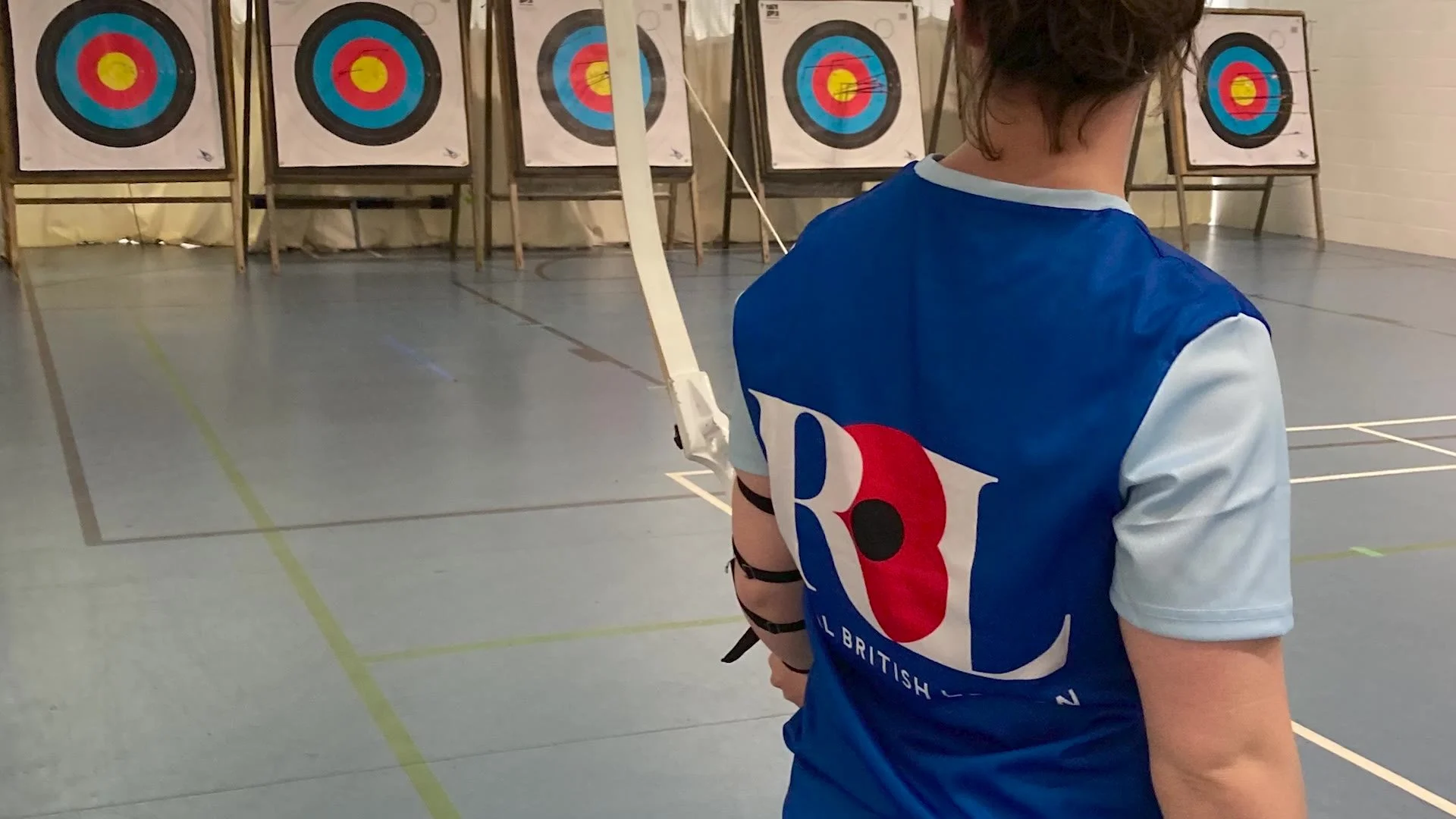 Archery session in a Royal British Legion top