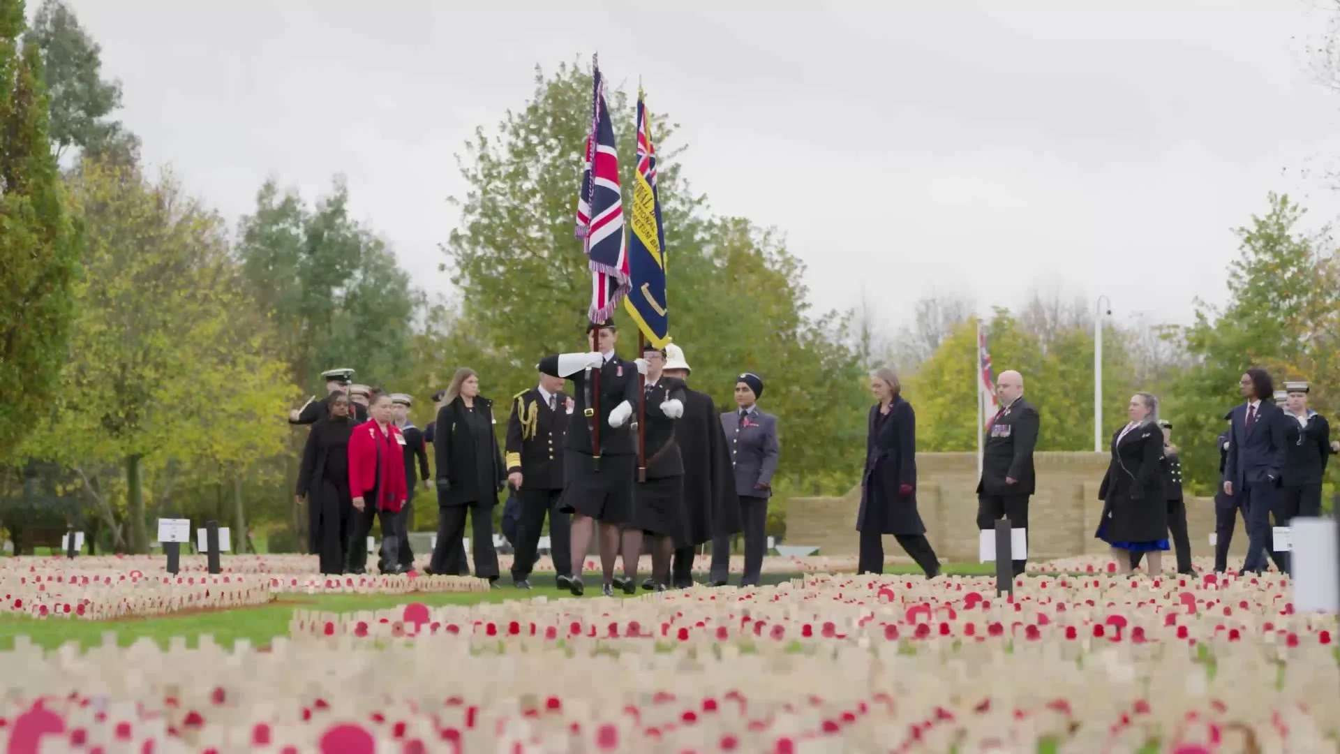 The remembrance ceremony with standards and flags
