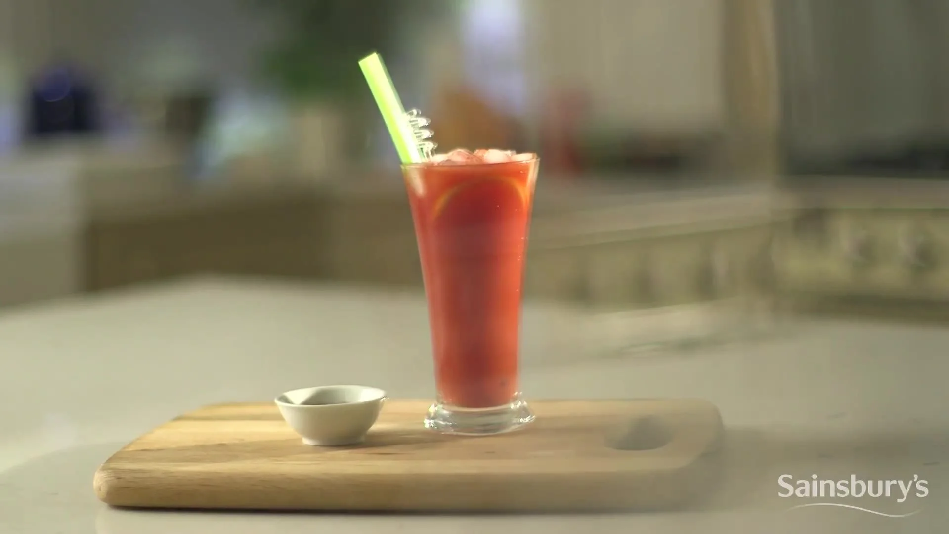A finished breakfast cocktail with celery
