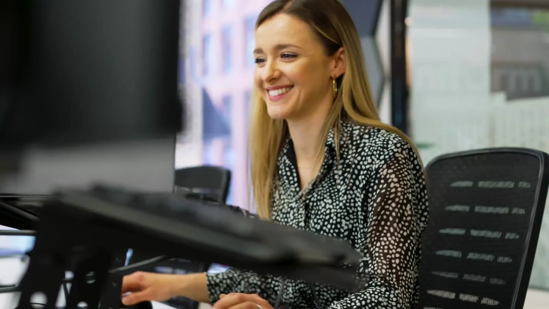 Montash customer relationship manager at her desk