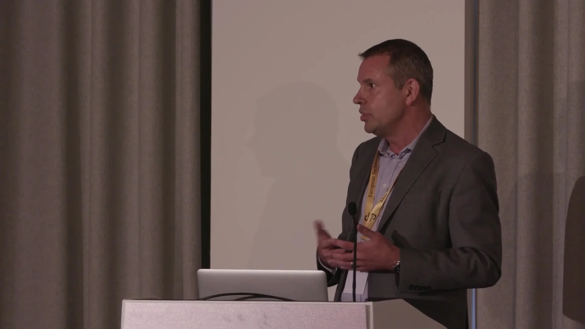 A speaker at the lectern