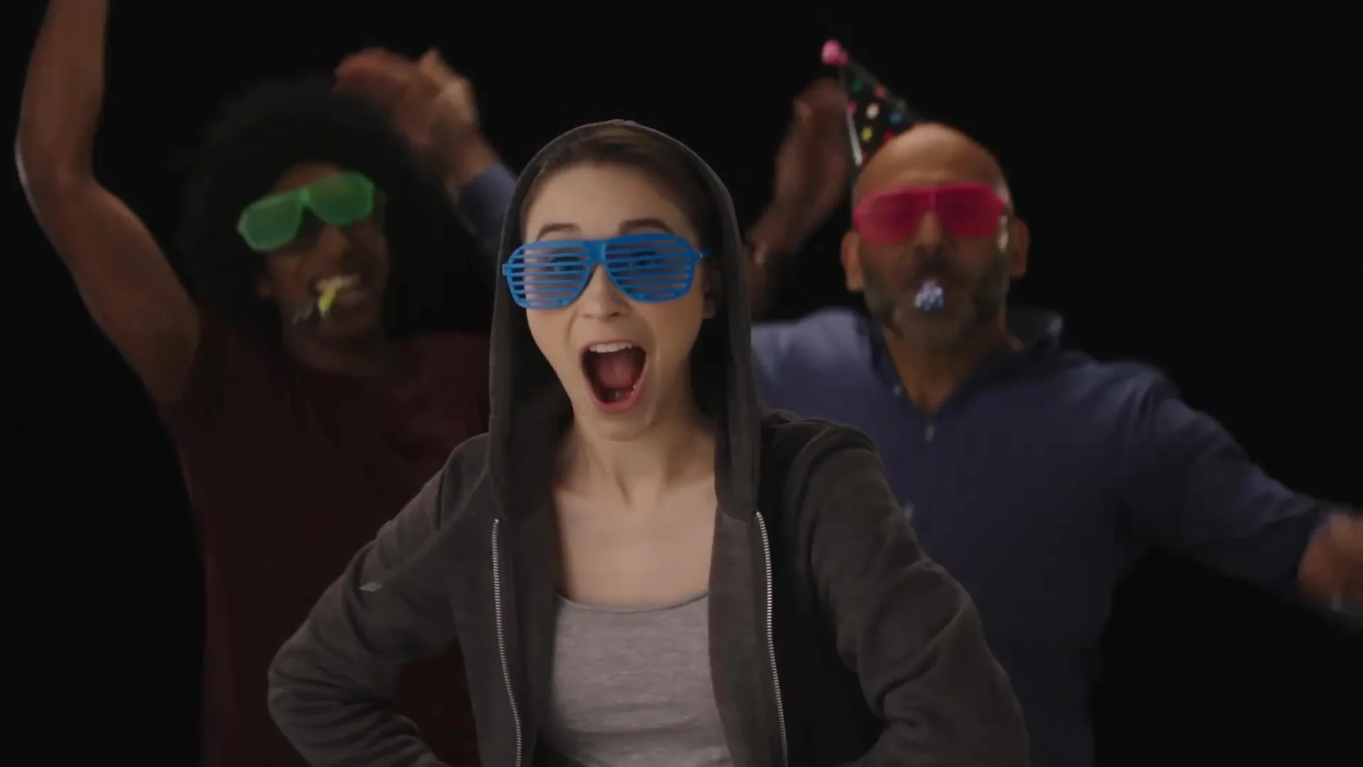 A dance sequence with party props