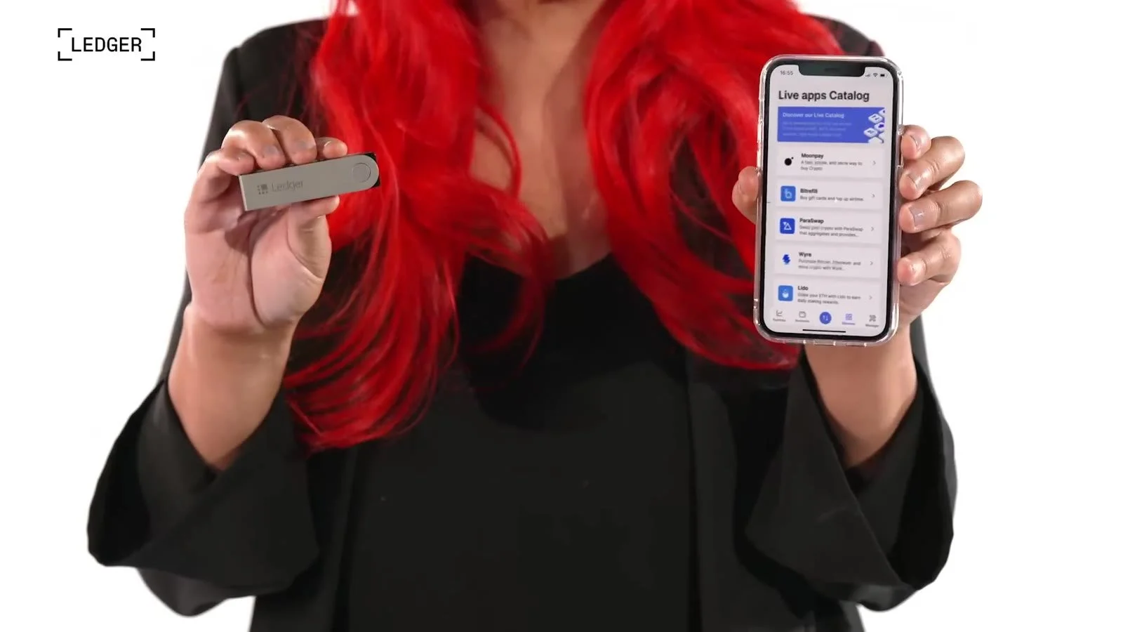 The Ledger hardware wallet and Ledger Live app held up to camera