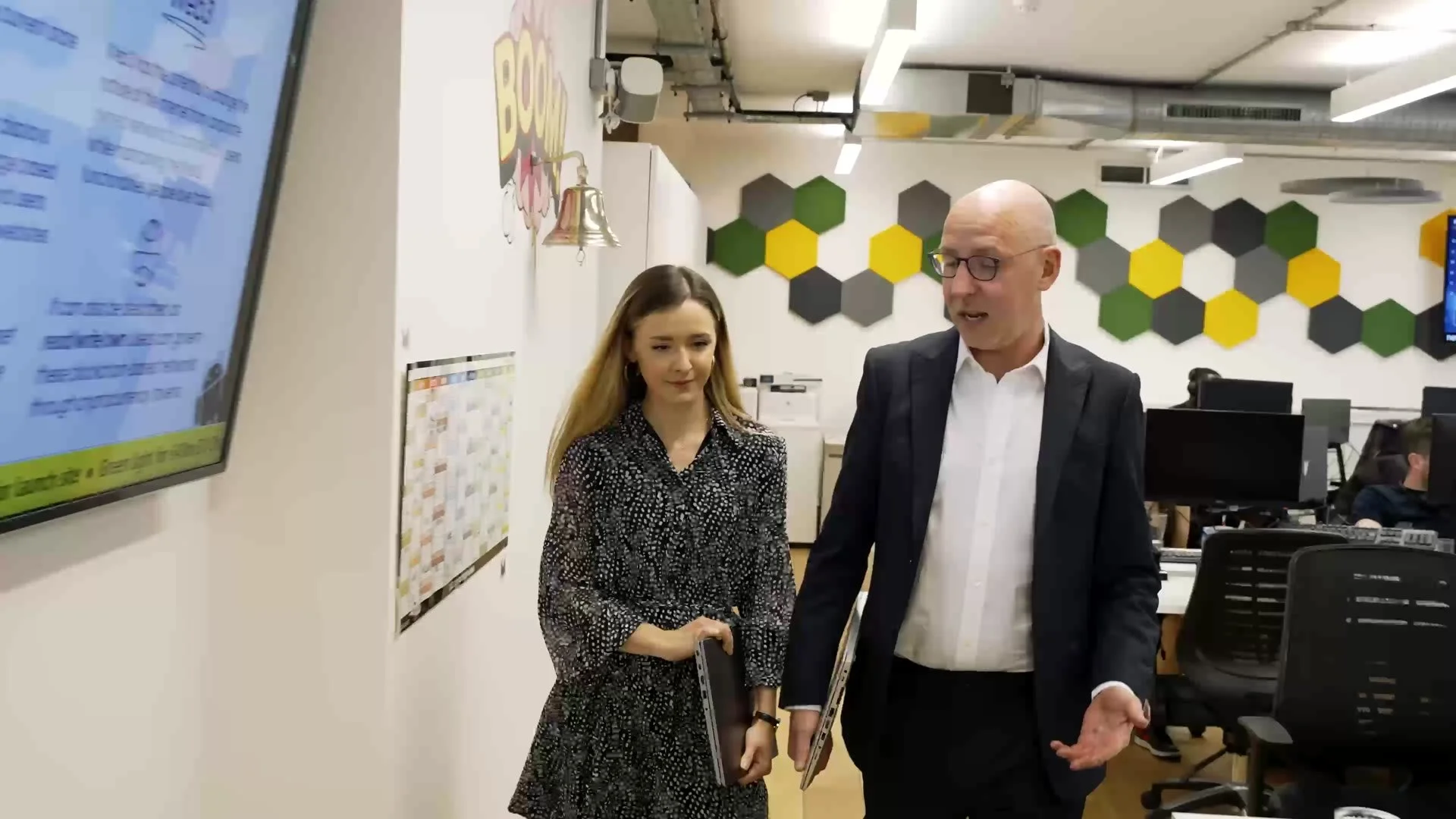 Montash consultant walking a client through the office