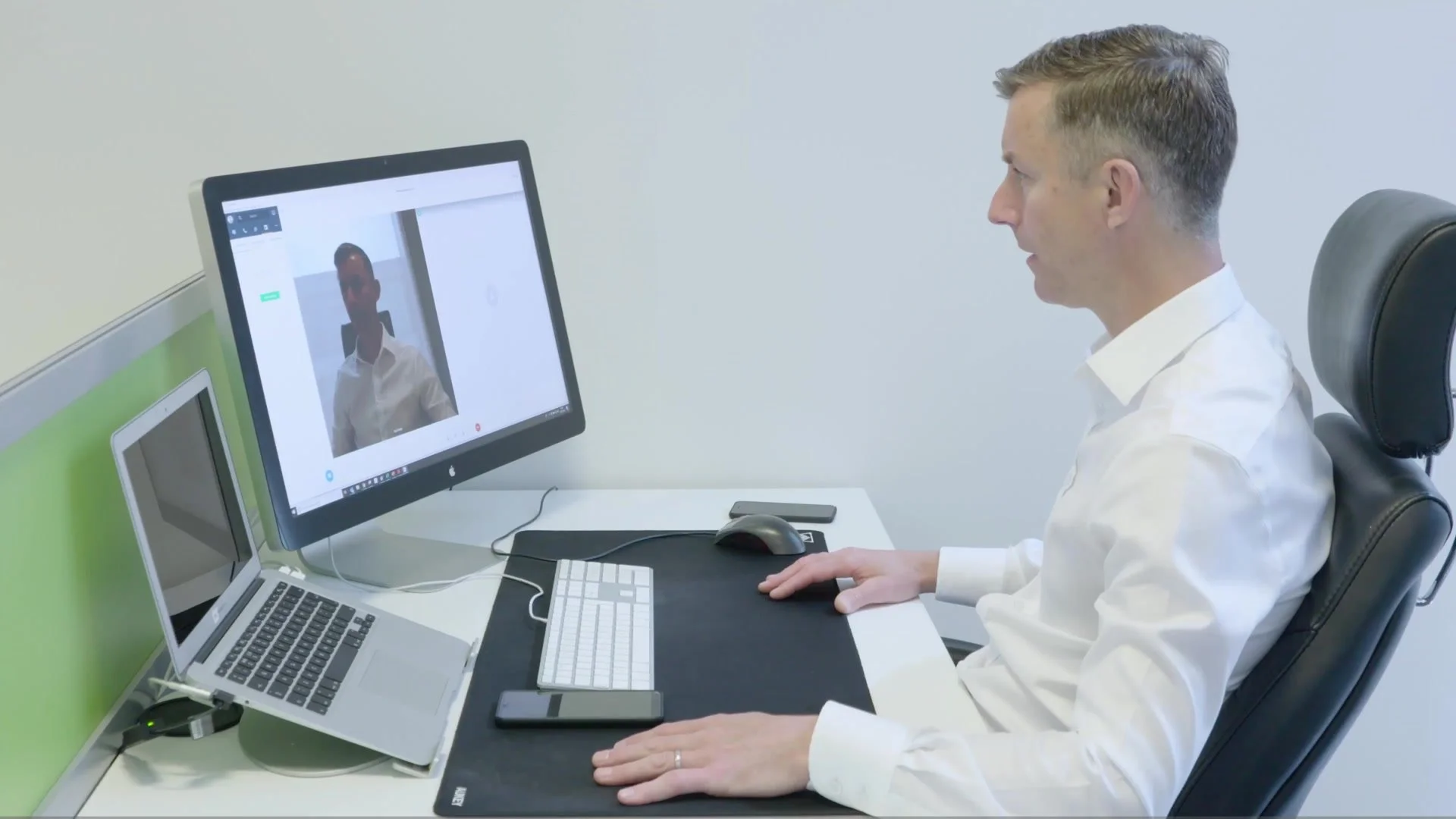 A video call at a desk