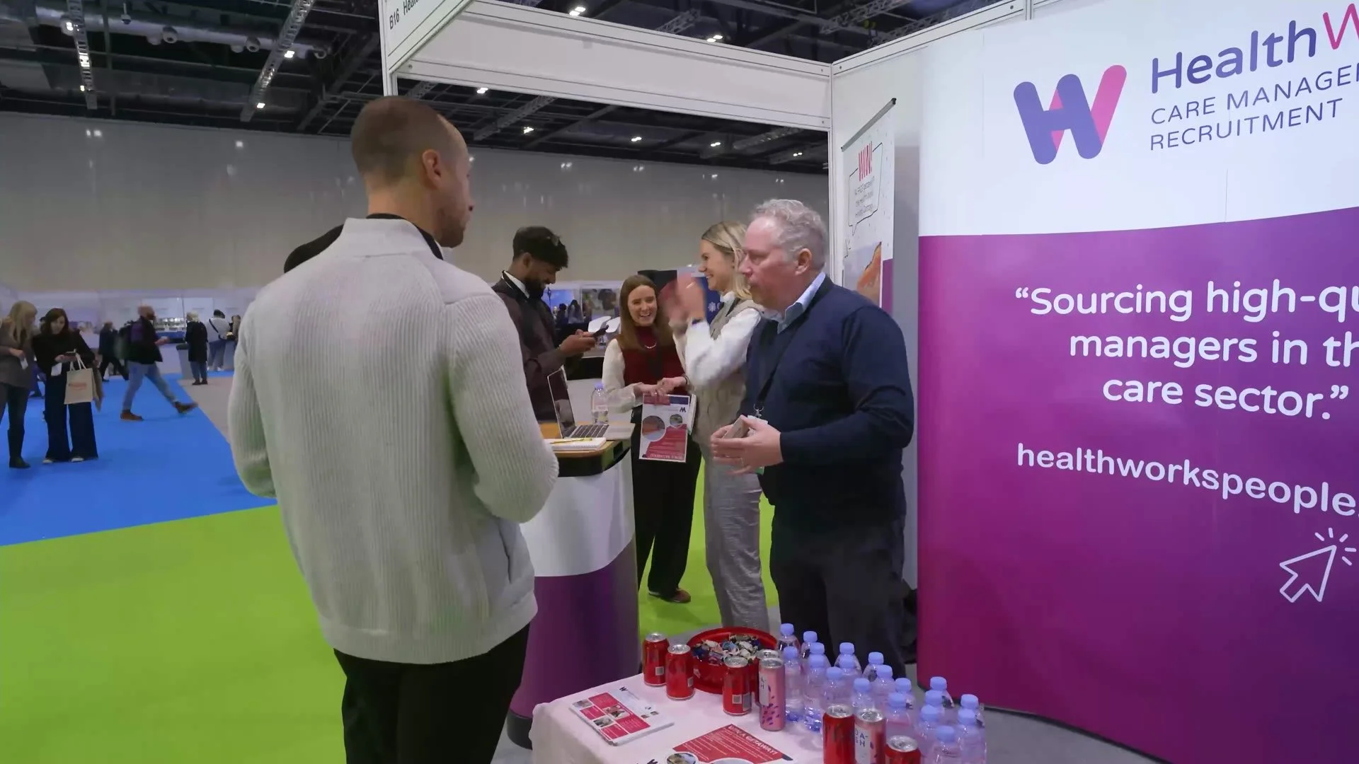 Visitors at an exhibitor’s stand