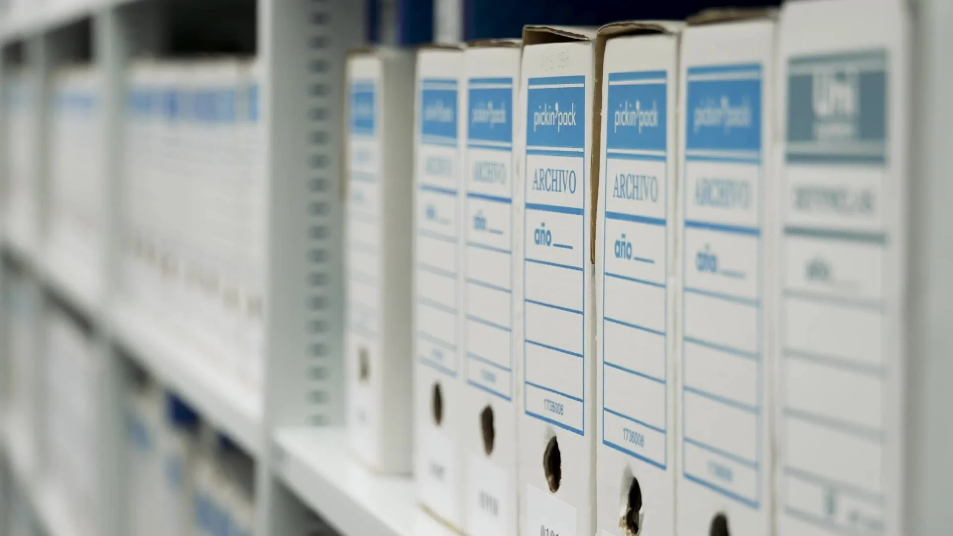 Archive boxes of documents on shelves