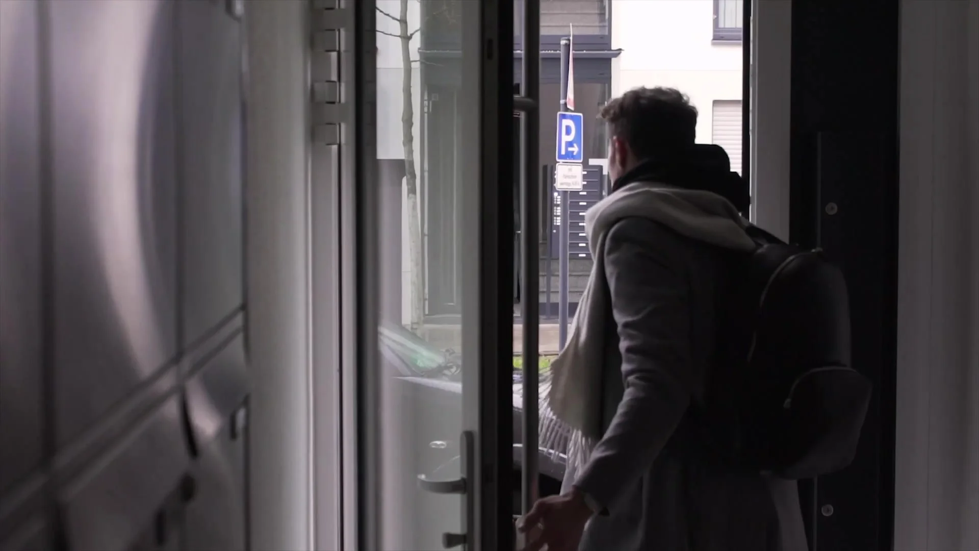 Creator heading out of the door with a backpack