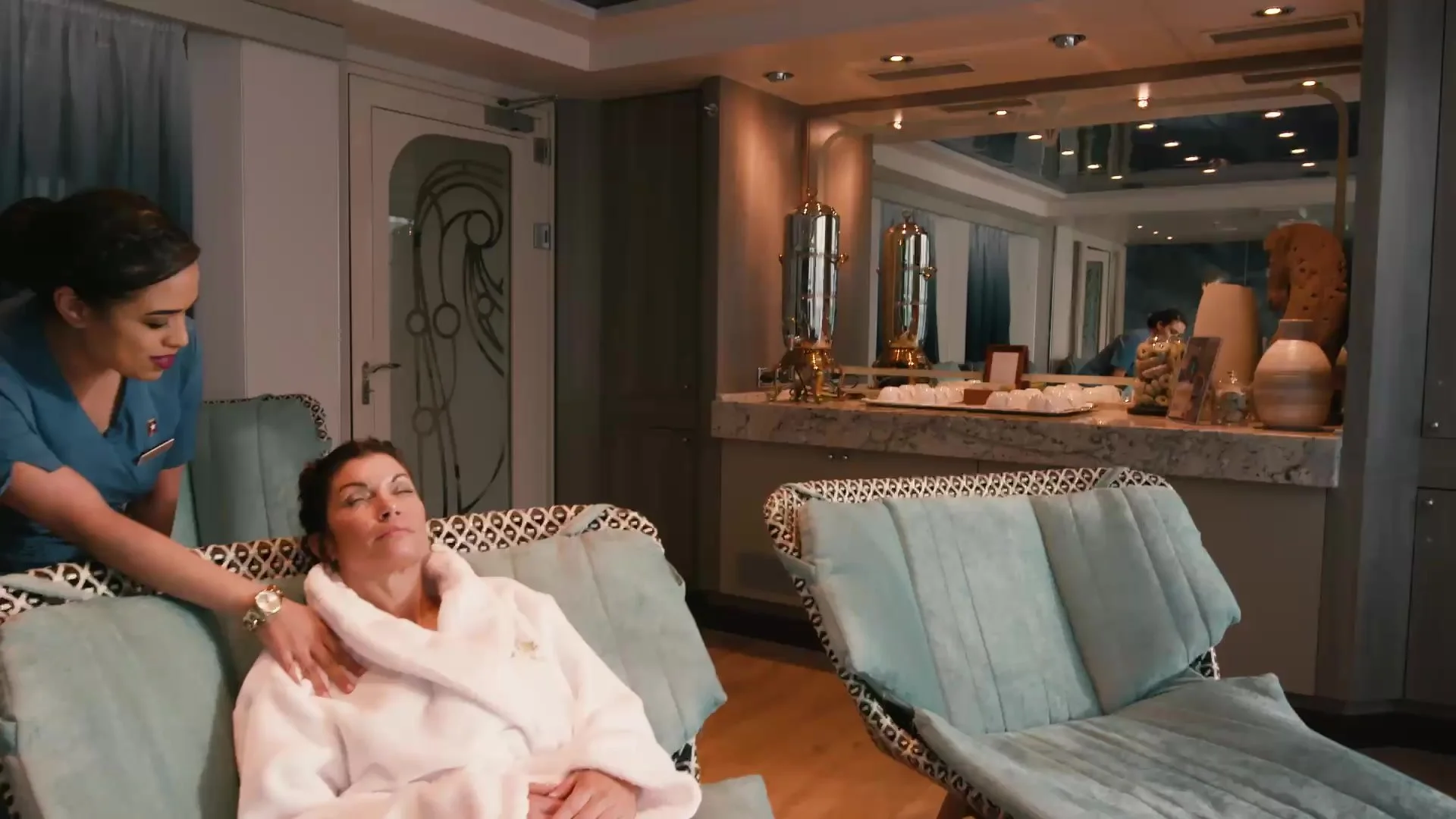 Therapist with a guest in the treatment area