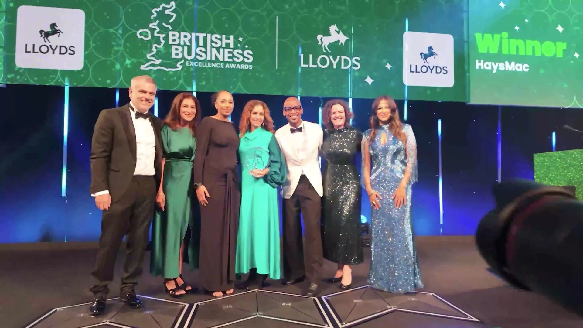 HaysMac team on stage collecting the Lloyds DE&I Champion of the Year award